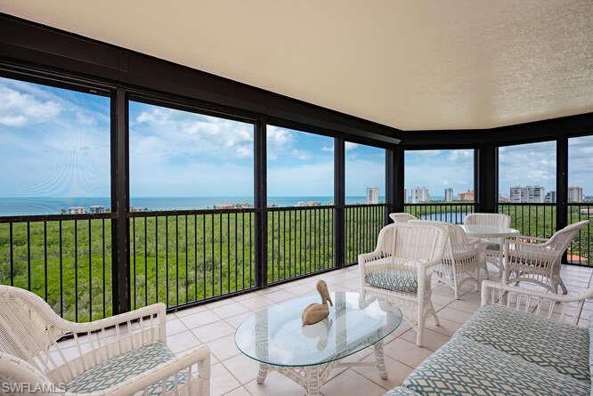 This elegantly maintained home provides the lifestyle everyone dreams about. The 2,555-square-foot, two-bedroom, 2-1/2 bath plus den residence radiates beauty and comfort. The soft finishes will enrapture one in comfort while feasting upon the magnificent vistas of the Gulf of America and Pelican Bay. Experience every sunrise and sunset while enjoying the sounds of songbirds and gentle breezes from two large lanais. Soak in the warmth of the Gulf, sun, and natural beauty of Southwest Florida while walking the berm or riding the tram through the mangroves and scenic waterways to the white sand beach and private clubhouse with outdoor dining. Situated within Pelican Bay, the Marbella is a luxury high-rise with amenities that are second to none. Our helpful staff of 75+ provide concierge, dining including room service, housekeeping, maintenance, assisted care and many more services at your fingertips.