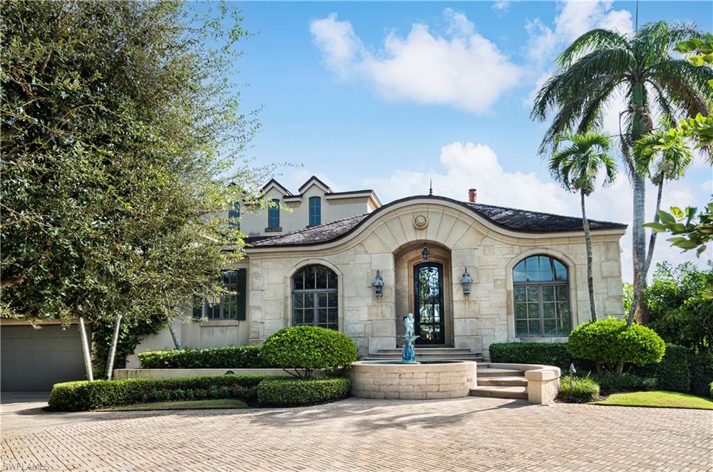 This waterfront home offers the best of all worlds in a spectacular location & setting. Never before available for sale, this custom residence is located on Spoonbill Cove at Crane Channel, with short and direct access to Naples Bay.   Just 3 blocks to the sugar sand Naples beaches, too, as well as being in the ultra sweet spot with close proximity/a short walk to historic Third St. S. for great dining, shopping, people watching & the Saturday Farmer's Market. The iconic Naples Pier is close by too, for sunset perfection. Designed by Jeff Harrell & built by Kurtz Homes with no detail overlooked, this residence offers wonderful areas to gather with friends & family, plus many elegantly comfortable spaces to retreat for privacy as desired. Luxurious finishes & details such as Venetian plaster, intricate ceiling detail (and high ceilings) abound.  This is a boater's dream home with a 37' x 19' boat slip & 13,000 lb. lift & dock alongside rear seawall mooring space, affording direct Gulf access. Marine garage for convenient storage & abundant storage generally in residence as well as the auto garage.  This is a beautiful home with great curb appeal. A rare opportunity! Paradise awaits.