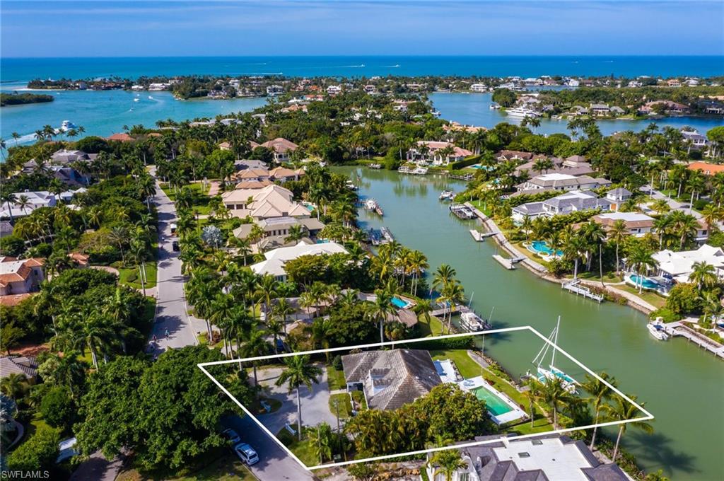 Build anew on this rarely available Admiralty Parade waterfront homesite in Port Royal, offering stunning water views across Harbour Head.  Situated near the western cul de sac of Admiralty Parade, this property presents a unique opportunity to custom design a waterfront wonderland in a highly coveted location.  Owners will also be eligible to join the Port Royal Club where members enjoy the finest private club experience including world-class dining, entertainment, private access to a pristine beach with club services, beachside pool, fitness, tennis and spa facilities.  Don’t miss this amazing offering!  Existing structure and dock are being sold as-is.