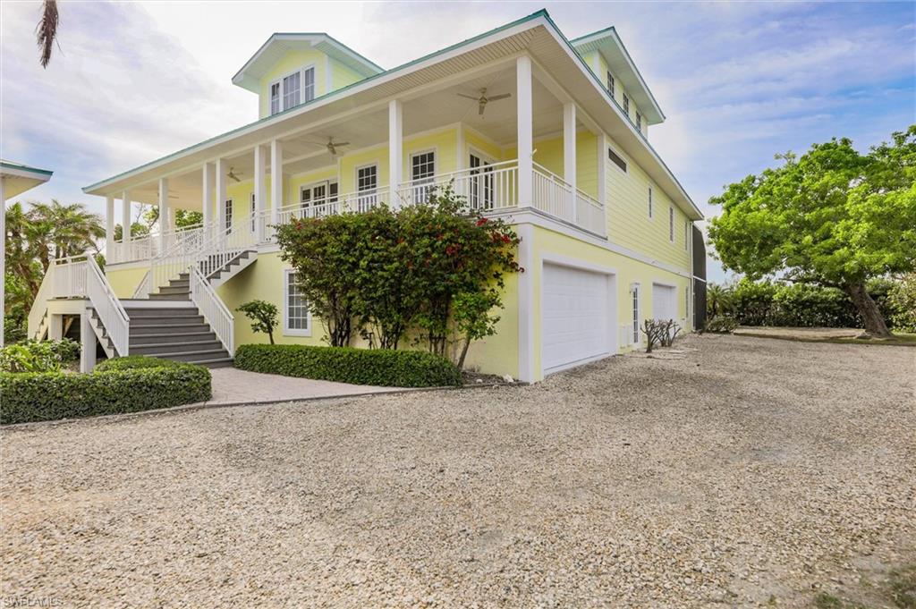 Discover waterfront living at its finest on Sanibel Island, where this exceptional residence harmoniously blends luxury and coastal charm. This magnificent property encompasses 4,287 sq. ft. of thoughtfully designed living space, offering 4 bedrooms and 4+ bathrooms for the ultimate in comfort and privacy. The home's very private location provides direct bayou access with a private boathouse and dock, making your nautical adventures as simple as stepping out your back door. Gulf access beckons the passionate mariner, while the serene waters create an enchanting backdrop for daily living. The private road setting ensures an exclusive retreat, perfectly complementing the island's natural tranquility. Nature enthusiasts will appreciate the proximity to Albright Island Preserve, a pristine sanctuary mere moments away, offering countless opportunities for wildlife observation. The primary bedroom serves as a luxurious haven, while 3 additional bedrooms provide spacious accommodations for family and guests. Every detail of this residence has been carefully considered, from the sophisticated interior finishes to the engaging outdoor spaces that capture the essence of Florida's lifestyle.