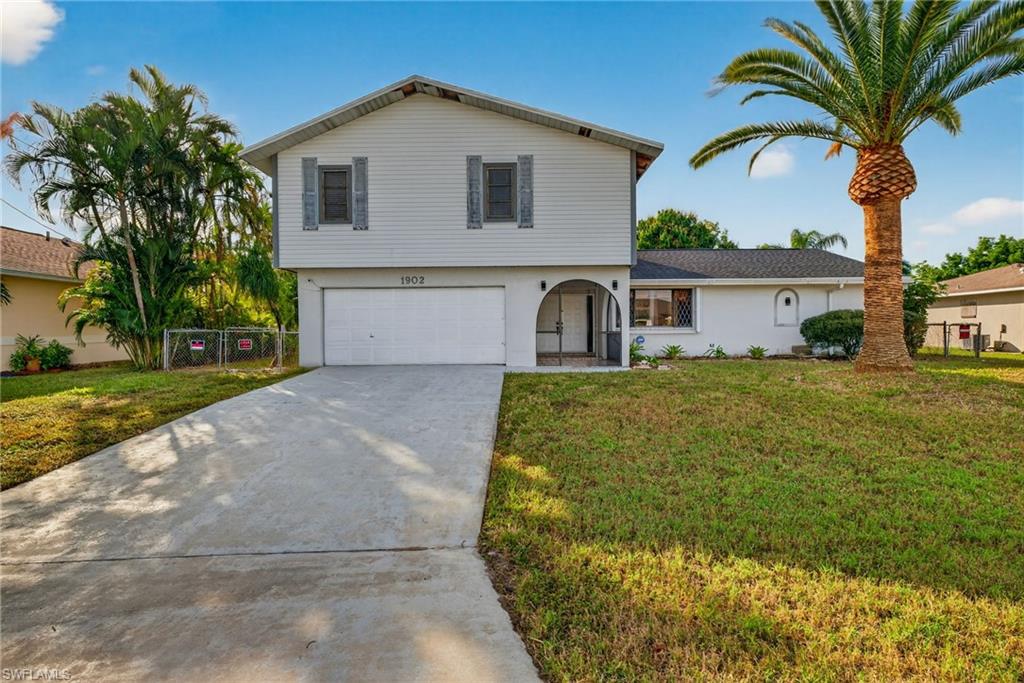 Spacious two-story pool home, NEEDING SOME TLC, offering exceptional potential in a prime Cape Coral location. Situated on a generous lot with mature landscaping, this property features a flexible floorplan and ample square footage - ideal for those looking to renovate and add value. The home would make a perfect opportunity for investors or buyers with vision seeking to customize a large family residence. Ideal location close to Del Prado Blvd with easy access to shopping, dining, and everyday amenities. With its size, lot, and pool, this property could be transformed into a stunning primary residence, vacation home, or income producing investment. Bring your contractor and imagination- opportunities like this in such a desirable area don't come often.NEW Roof 2023