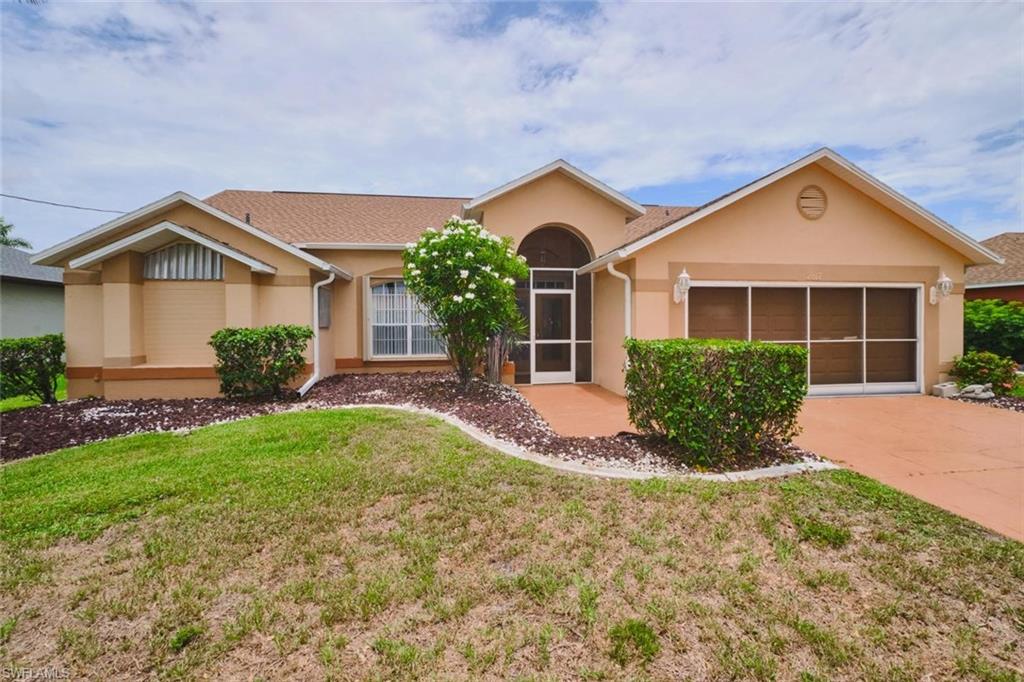 Some addresses in Cape Coral simply cannot be replicated — and this is one of them. Situated on one of Southwest Florida's most prestigious corridors and surrounded by high end homes, this 2,102 sq ft, 3-bedroom, 2-bath pool home offers something increasingly rare in today's market: a legitimate opportunity to own your forever address and make it entirely your own. Built in 1994 and lovingly maintained by its original owners, the home features a newer roof, newer AC, and every mechanical detail attended to with meticulous care. Out back, a beautiful screened pool enclosure gives you the Florida lifestyle on day one. The neighbors are mansions. The street is the address people in this market spend years trying to land. If you've been waiting for the right canvas on the right block — this is it.