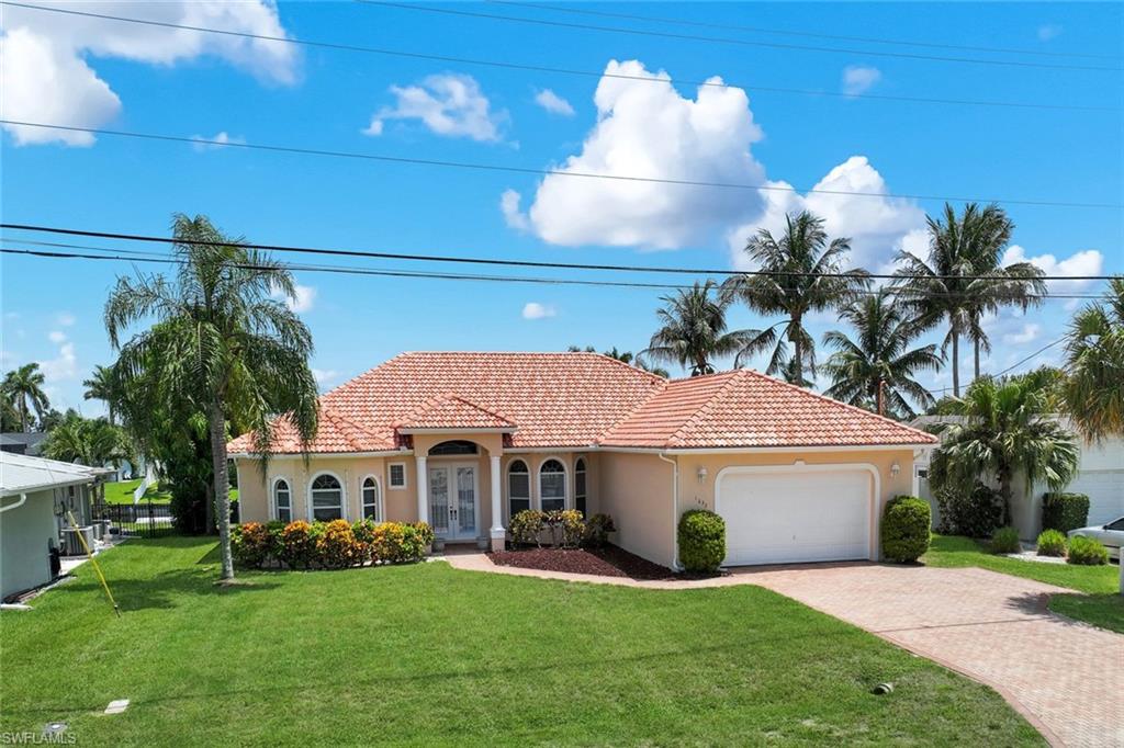 Experience exceptional waterfront living in this 3-bedroom, 3-bathroom Gulf access home offering 2,518 square feet of living space in the highly sought-after Savona neighborhood. Perfectly positioned on a 100-foot-wide canal with just 5-minute sailboat access to open water, this property combines an unbeatable location with one of Cape Coral's most desirable boating lifestyles.

The open floor plan is designed for comfortable everyday living and effortless entertaining, with spacious living areas that flow seamlessly to the outdoor oasis. A southern rear exposure fills the backyard with sunshine all day, highlighting the newly resurfaced pool (2026), spa, and expansive paver pool deck—the perfect place to relax, entertain, and enjoy the wide canal views.

Boating enthusiasts will appreciate the concrete dock, seawall, and quick, bridge-free access to the Caloosahatchee River and the Gulf of Mexico. The home also features a tile roof, paver driveway, and three full bathrooms, providing plenty of space for family and guests.

Located in the prestigious Savona neighborhood, you'll enjoy easy access to Cape Harbour, downtown Cape Coral, waterfront dining, shopping, and entertainment.

With its rare combination of southern exposure, 100-foot-wide canal, open floor plan, and incredibly fast sailboat Gulf access, this home offers the very best of Southwest Florida waterfront living.