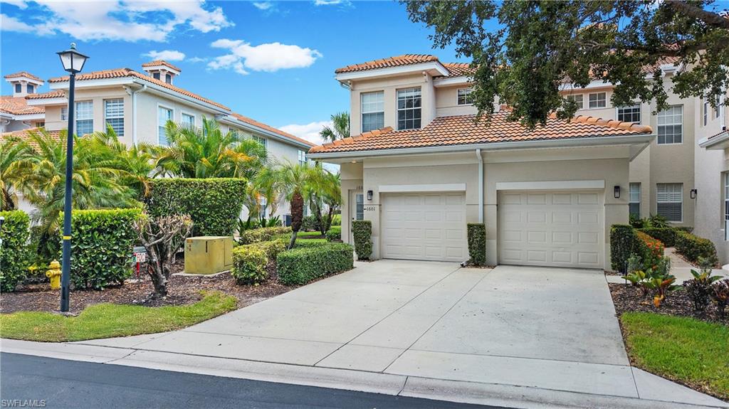 Perched on the second floor as a private END-UNIT, this three-bedroom, two-and-a-half bath carriage home in Turtle Bay at Bridgewater Bay pairs peaceful lake views with the ease of true resort-style living in North Naples.

Inside, nearly 1,850 square feet unfolds beneath soaring vaulted ceilings, with tile flooring throughout for a clean, low-maintenance feel. The kitchen offers ample cabinetry and stainless-steel appliances, flowing naturally into open living and dining spaces. The primary suite provides a comfortable retreat with an en-suite bath and walk-in closet, while a private screened lanai extends the living space outdoors—perfect for morning coffee or evening unwinding.

Every major system here has been thoughtfully updated: a new TRANE air conditioning system (2025), new washer and dryer (2024), and fresh interior paint throughout (2024) make this home genuinely move-in ready. An attached one-car garage adds everyday convenience and extra storage.

Bridgewater Bay delivers an exceptional amenity package, anchored by a newly renovated clubhouse, resort-style and lap pools, a fitness center, tennis, pickleball, bocce, and basketball courts. Boaters and outdoor enthusiasts will appreciate the community's rare, secure, fenced storage for boats, trailers, and RVs.

Ideally positioned near Naples' world-famous beaches, Mercato, Waterside Shops, fine dining, championship golf, and I-75, this home also falls within the well-regarded Collier County Public Schools district—modern living in Naples at its finest.

Experience everything this Bridgewater Bay residence has to offer.