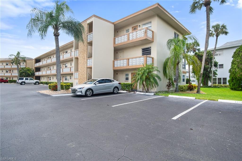 Location, Location, Location! 2 bedroom, 1.5 bath ground floor condo unit w/Gulf access!  Spacious well maintained home, ceiling fans, ceramic tiles, carpet throughout home with abundant windows providing ample natural sunlight. 55+ community, common laundry, extra storage, elevator, clubhouse, trailer storage, and jogging paths. Sizeable heated swimming pool with electric operated solar blanket. Walking distance to Publix, restaurants, and shops. Come make this your safe haven home.