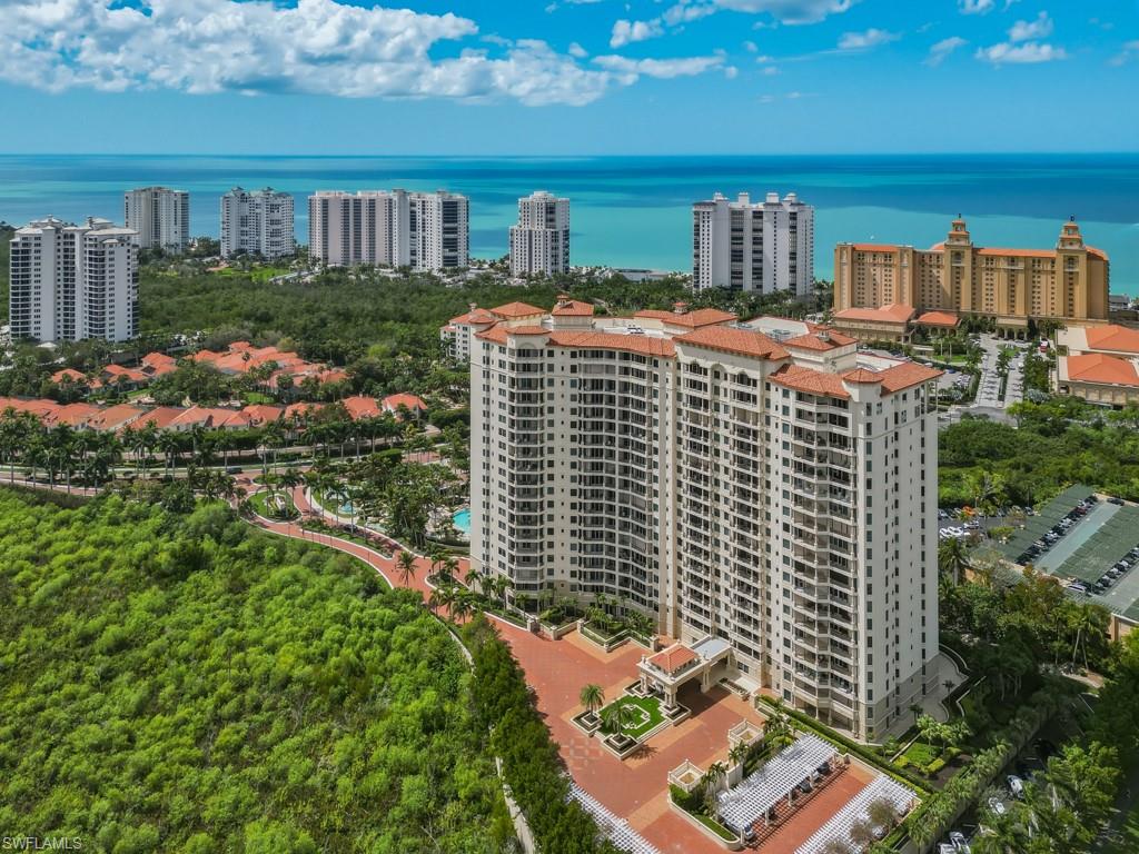 Experience the pinnacle of coastal living in the stunning 4-bedroom 4.5-bathroom Bay Colony condominium. Offering modern upgrades and an unbeatable location; this property is an ideal retreat for those seeking relaxation or a prime investment opportunity. Ideally situated just steps from the beach this residence provides a blend of sophisticated elegance and modern comfort. Renovated with the most High-end finishes, Kelly Wearstler & Johnathan Adler lighting, Legno Bastone French Oak flooring, and an open floor plan designed for effortless entertaining. The Gourmet Kitchen features quartz countertops, custom cabinetry, Wolf gas range, Wolf double oven, Sub-Zero refrigerator/freezer, Subzero wine refrigerator & refrigerator drawers, Miele coffee system, plus 2 Miele dishwashers. Primary bath is accented by custom vanities with marble counter, Johnathan Adler lighting, shower/tub have marble surrounds. The Trieste is a full-service tower with 24-hour staff & attended front desk, grand salon, library/board room, fitness facility, two guest suites, and resort style pool for owners' exclusive use. The lobby and social areas were totally renovated in 2022. Additional Bay Colony amenities include their Beach Club's casual open-air dining and bar service poolside, indoor dining, attended beach services, an active tennis program, plus all Pelican Bay Community amenities as well. Bay Colony is located minutes to restaurants and night life of Mercato or Downtown 5th Avenue. Don't miss this opportunity for your very own piece of paradise.
