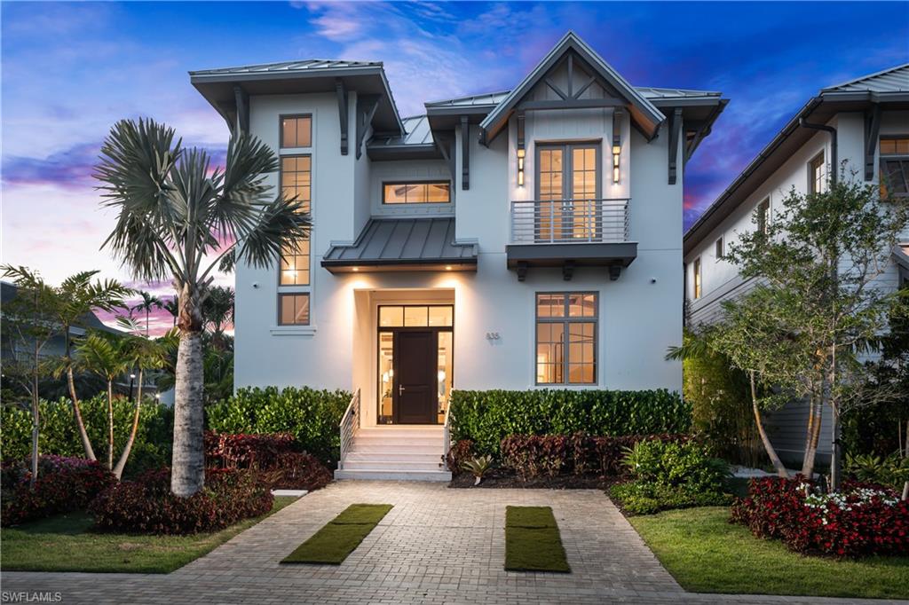 Set along one of Old Naples’ quiet, palm-lined streets and just a short stroll from the Gulf and Third Street South, 835 11th Avenue South presents modern craftsmanship with timeless design. Built by Lotus Construction, in collaboration with MHK Architecture and Freestyle Interiors, the home reflects a thoughtful approach to scale, proportion, and livability rather than excess.

The residence spans more than 4,700 square feet of interior living space and is arranged to support both privacy and connection, offering four ensuite bedrooms and six bathrooms featuring Neorest Toto toilets. On the main floor, the primary suite is intentionally positioned for convenience and discretion, featuring a spa-inspired bath with a soaking tub, glass-enclosed shower, floating dual vanities, private water closet, and the added luxury of an in-suite washer and dryer—ideal for true single-level living.

The heart of the home is defined by soaring ceilings, abundant natural light, and a calm material palette. Wide-plank white oak flooring, tailored millwork, and soft neutral tones establish a refined backdrop for daily life. The kitchen is both elegant and highly functional, outfitted with integrated refrigeration, dual wall ovens, concealed storage, and streamlined cabinetry that transitions seamlessly into the dining and great room. Large hurricane-impact sliding doors open the interior to the outdoor living area, creating an effortless indoor-outdoor connection.

A thoughtfully finished elevator provides smooth access between levels. Upstairs, a private VIP suite offers exceptional flexibility, complete with its own living area, full bath, and two balconies—well suited for extended guests or multi-generational living. Two additional guest suites and a dedicated laundry room complete the upper level, and a home generator is in place for additional peace of mind. 

Outdoors, the rear courtyard is designed for relaxed entertaining, centered around a custom pool and spa, covered lounge, full outdoor kitchen, and pool bath. The setting is private and quiet, enhanced by alley access. A three-car garage—an uncommon amenity in Old Naples—features extra ceiling height suitable for vehicle lifts or specialized storage. 

Just blocks from Naples’ most celebrated dining, boutiques, and cultural destinations, this home delivers a rare combination of architectural discipline, location, and immediate enjoyment. It is a residence defined by enduring quality and thoughtful design—crafted to be appreciated long after the first impression.