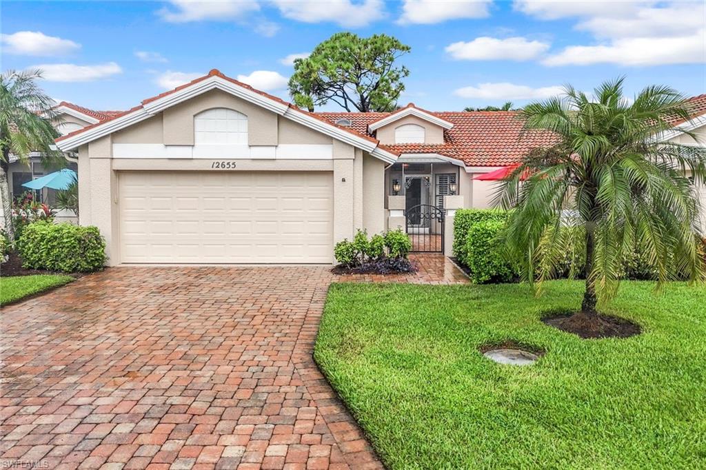 This charming 3 bedroom, 2 bath courtyard villa home is nicely furnished, meticulously maintained, and move-in ready, with a $50,000 golf membership included. The open split-bedroom floorplan offers comfort and privacy, with the main suite and guest bedrooms each featuring ensuite baths. Enjoy the efficiency and organization with built-in shelves and drawers in all bedroom closets. Both the main and guest bathrooms have been completely renovated (September 2025) with brand-new, high-end finishes. Throughout the home, plantation shutters add timeless style, while electric shades on the living room and lanai windows provide privacy, ease, and convenience. The large enclosed lanai under air is perfect for indoor/outdoor living and entertaining, and the private courtyard entry with pavers creates a welcoming space for grilling and outdoor gatherings. Additional highlights include a large paver driveway, an oversized two-car attached garage featuring epoxy floors with 2 built-in storage cabinets, and recent updates such as a Wi-Fi enabled A/C (2019), washer & dryer (2023) refrigerator (2024), and water heater (2025). Peaceful and private, this meticulously cared for villa combines tasteful furnishings, modern updates, and effortless Florida living. Hunters Ridge is a private Golf & Country Club, not a bundled community. With only 420 golf members and no Chelsea system, golf enthusiasts enjoy the freedom to play as often as they like. The Club is known for its welcoming, relaxed atmosphere and offers a vibrant calendar of social and golf activities. Only six miles from Barefoot Beach Preserve, Hunters Ridge provides quick access to premier shopping, dining, entertainment, and RSW Airport. Within the community, residents enjoy an 18-hole championship golf course, state-of-the-art golf simulators, a spacious resort style pool with food and beverage service, tennis courts, pickleball courts, and much more. The clubhouse features both elegant dining and a casual grill room. Adding to the lifestyle appeal, a major renovation is currently underway. The Activity and Fitness Center is being transformed into a modern, updated Community Center with expanded fitness and wellness amenities an exciting enhancement that will elevate daily living, increase home values, and truly bring resort style wellness to your doorstep.