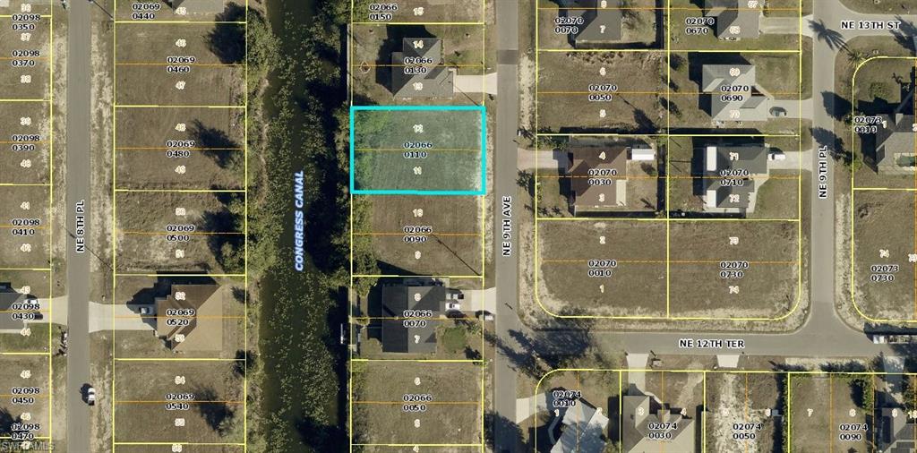 Nice western rear exposure canal lot in area of new homes. New construction in area. Beautiful lot offers a unique opportunity to build the home of your dreams, Situated in Cape Coral a quiet area, with Canal Access, this land boasts panoramic views and in a convenient location close to local amenities. With ample space to design and build, this lot is perfect for those looking to create their own personal paradise. Don't miss the chance to turn this land into your HOME!!