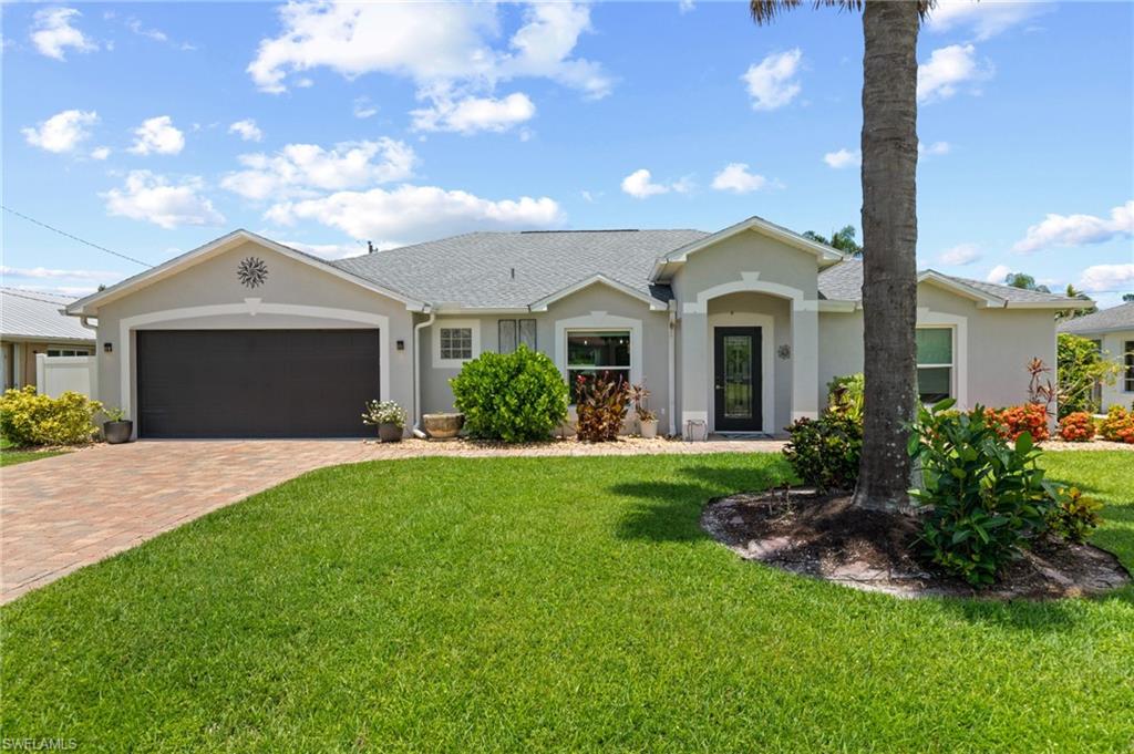 Welcome to 2914 SE 8th Ave in Cape Coral, a 3 bedroom plus a den, 2 bath single-story pool home with 2,013 sq ft (built 2000) on a 10,018 sq ft lot. The home has been completely remodeled, including a fully updated kitchen and both bathrooms with all-new materials, plus new appliances, new HVAC and ductwork, new impact-resistant windows, fresh interior and exterior paint, and light gray porcelain tile throughout.

Offering wonderful flexibility, a separate den features its own closet and can easily be utilized as a fourth bedroom. Storage is never an issue, as you will find lots of closets throughout the home, including a storage closet in the garage.

Additional improvements include a re-insulated attic, new ceiling fans in all bedrooms, the living area, and the lanai, new sinks and faucets, an outdoor shower near the pool, and new garden beds on both sides of the backyard. Outside, buyers will love the fully fenced backyard for added privacy and an oversized driveway that provides ample parking. Moving in is a breeze with city utilities already in place and all assessments paid.

During Hurricane Ian, the property did not flood; the only noted issue was older lanai screening, which has since been replaced. With an estimated $250,000+ in recent improvements this home offers updated systems and finishes designed for comfortable everyday living and easy entertaining.