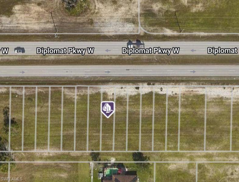 Cleared VACANT LOT zoned Commercial Professional (CP), free of any animal restrictions.  This area is part of the NORTH 6 2030 City Utilities Expansion, starting in 2030 city water and sewer will be
added to this entire area. Cape Coral is experiencing exponential growth and this area will be undergoing major construction in the coming years.
(2008, 2016 & 1936 Diplomat Parkway E is also available, identical Lot sizes and zoning) - AGENTS SEE PRIVATE REMARKS