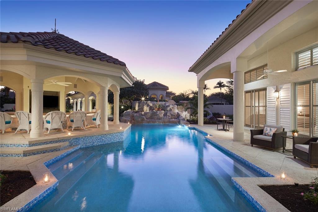 Enter this private courtyard into a tropical oasis.  Located in Grand Isle in Pelican Marsh, this unique property expands over two lots to create a thoughtfully private entertaining space encompassing the main house, cabanas, and oversized media room situated completely independent of common walls. Filled with natural light, the main house has peaceful water views, soaring ceilings, two bedrooms and a private study.  Just off the courtyard pool area are two cabana suites designed for the privacy and comfort of your guests.  Take a stroll across the koi pond to the media room which includes an oversized family and flex room and a covered lanai with wonderful water views.  This property has it all, the only thing missing is you!  Pelican Marsh is a gated amenity rich community offering a top tennis program, exercise facility, bocce ball courts and the private Pelican Marsh Golf Club with optional memberships.  Located in North Naples, this home is close to Mercato, Waterside Shops, Artis-Naples and beautiful beaches.  This property is being sold as-is.