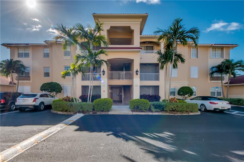 This first floor Porto Vista Mediterranean style condo is ready for you ! The 2 bed 2 bath condo boasts a secure lobby, elevator, new carpet, fresh paint throughout, recessed lighting, tray ceilings, kitchen backsplash, screened lanai, new roof, microwave and exterior paint in 2019, water heater and dryer in 2018. This bright charming home is the best priced in Porto Vista and is move in ready. Enjoy the resort style amenities just feet away from your door. It's within walking distance of shopping, restaurants and a stones throw to the magnificent Cape Harbour Marina. Hurry, this gem won't last !