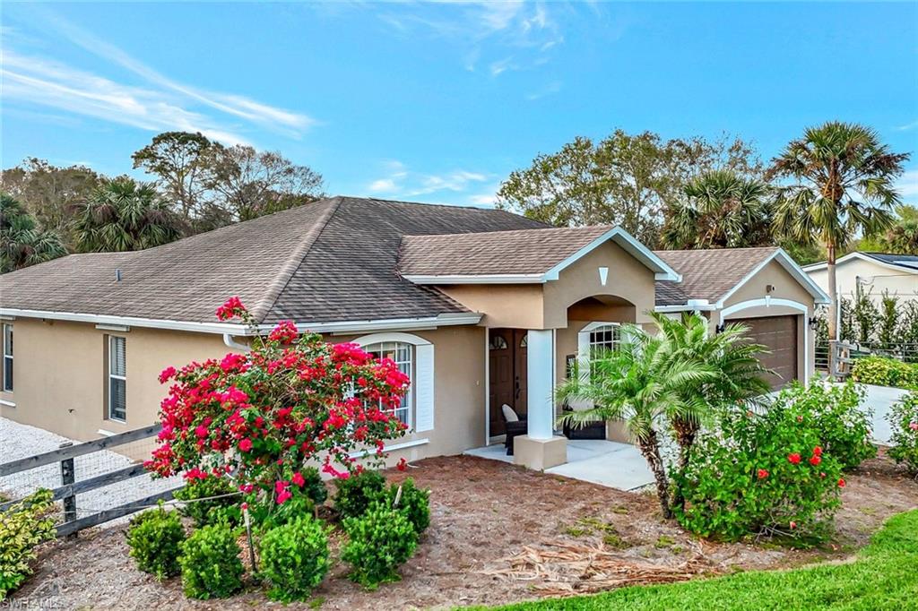 Welcome to this exceptional 4-bedroom, 2-bathroom rental home in Golden Gate Estates, Naples, Florida, situated on a private 2.34-acre lot. Offering the perfect combination of space, privacy, and modern upgrades, this beautifully maintained property is ideal for tenants seeking room to spread out while remaining close to shopping, dining, schools, and Southwest Florida's world-famous beaches.

A long paved driveway provides ample parking for multiple vehicles, boats, work trucks, trailers, and RVs, making this property a rare find in Naples. Inside, you'll discover soaring vaulted ceilings, abundant natural light, an open-concept floor plan, and durable wood-look tile flooring throughout.

The updated kitchen is designed for both everyday living and entertaining, featuring a large center island with seating and storage, upgraded white cabinetry, quartz-style countertops, designer backsplash, pantry, wine cooler, and modern lighting. The spacious living and dining areas flow seamlessly together, creating a comfortable and inviting atmosphere.

Step outside to your own private outdoor retreat featuring an expansive composite deck, gazebo, multiple seating areas, and over two acres of peaceful natural surroundings. Whether you're enjoying morning coffee, hosting friends, or simply relaxing after a long day, this outdoor space offers the tranquility and privacy that Golden Gate Estates is known for.

If you're searching for a Naples rental home with acreage, RV parking, boat parking, modern upgrades, and exceptional outdoor living space, this property delivers it all.