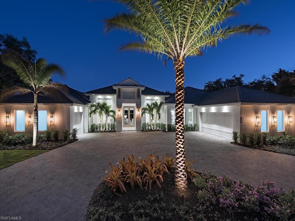 Beautiful New Construction Home in Pelican Bay with Southern Exposure on Over-sized Lot!  Spacious Great-Room Plan with floor to ceiling Grabill Cabinetry in Kitchen, Service Kitchen and Laundry Room. Master Wing includes: Large Master Bathroom with Two Water Closets, Study, Two Master Closets, Sitting Room/Exercise Room. Enjoy the Outdoor Living with over-sized Pool Deck that has sun all day, Gas heated Pool and Spa, Gas Fireplace, Outdoor Kitchen (with Gas Grill, Ice-Maker and Beverage Refrigerator), Electric Screens  & Shutters and Pool Bath. Bonus Outdoor Gazebo with fire-pit and seating. Upgrades Include: Wide plank 9-1/2" Francois & Co. Wood Floors, Grabill Custom Cabinets, Sub-zero Integrated Refrigerator and Freezer and 48" Wolf Gas Cooktop.  Service Kitchen includes:  Miele built-in Coffee, Wolf Steam Oven, Wall Oven, Warming Drawer, Sub-zero Refrigerator, Stand-alone Ice and Wine Cooler.  Custom Ceiling Beam Work, Security system, Central Vac System, Camera System, Cinema Ceiling Speakers and pre-wire for Surround Sound in Great Room, Audio Speakers and pre-wire in Master Suite and Lanai Covered areas, and Control 4 Lighting System in Public Areas and Master Wing.