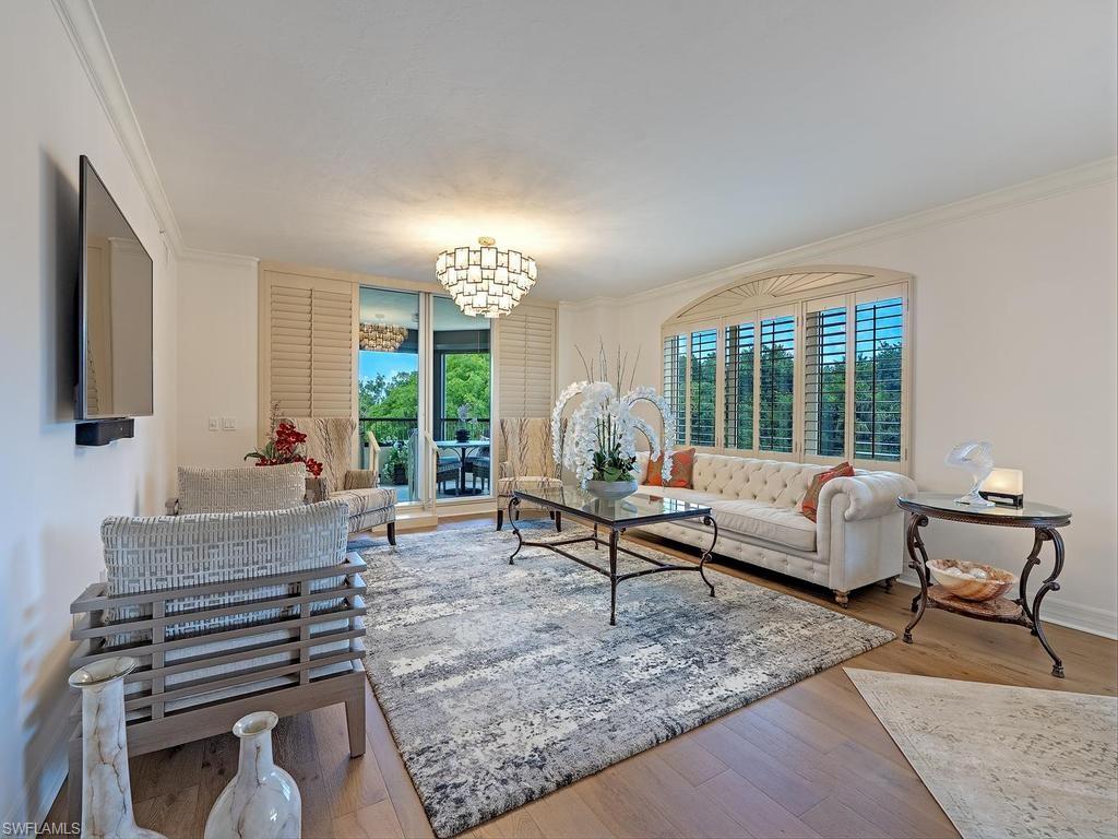 Experience luxury resort-style living in this spacious 2-bedroom plus den, 3-bath residence boasting 2,555 square feet of living area in the heart of Pelican Bay. Located on the second floor of a prestigious high-rise, this elegant home features both eastern and western exposure with private balconies to enjoy beautiful sunrise and sunset views.
Designed for comfort and convenience, residents enjoy concierge services, 24-hour staffed front desk, fitness center, full-service spa, beauty salon, four dining rooms, room service, and more.  An attached assisted living facility offers additional peace of mind and future flexibility if care services are ever desired. A private tram provides easy access to Pelican Bay's renowned beachfront amenities.
Offering the ultimate lock-and-leave lifestyle, this exceptional residence combines luxury, convenience, and a vibrant social atmosphere in one of Naples' most sought-after communities.