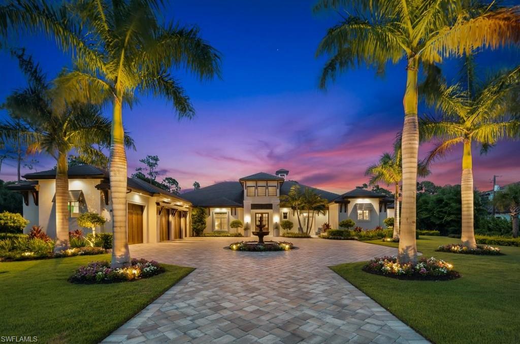 Extraordinary, like new, coastal contemporary custom estate home in sought after Pine Ridge Estates. Discover luxurious living at this one-of-a-kind residence on a 1.67 acre lot complete with resort-style pool/spa, fire features, putting green, media room and state-of-the art exercise room! The master retreat showcases an over-sized walk-in shower with multiple shower heads, free-standing soaking tub, dual sinks and two spectacular walk-in closets with island. The true chef’s kitchen features top of the line appliances, gas range, dual islands and full size wine cooler. Entertaining is a breeze with vast outdoor living areas encompassing a full kitchen with a gas grill, full size refrigerator, bar seating, dining area, and living area with a dual sided outdoor fireplace, which is shared with an outdoor entertaining area with pool table. The Residence is completed with an inviting, infinity-edge pool and spa with fire features that overlooks the putting green and well-manicured yard. Residence is conveniently located just a short distance from Mercato and the Waterside Shops and is a short drive to 5th Avenue South’s fine dining, world-class shopping and Naples’ white-sand beaches.