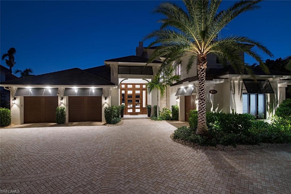 An absolutely stunning newly built custom Park Shore residence offering unrivaled long SW lake views and a superb level of finish and features throughout.  This 4 bedroom + office + exercise home offers nearly 4,500 square feet of living space and is situated with perfect exposure on one of the best lots west of 41.  Home offers an ideal great room layout, phenomenal outdoor living with seamless indoor to out integration, countless customized features, and truly stands out in every way.  Some of the features inside include a gourmet kitchen with Wolf/Sub-Zero/Miele appliances, butler’s pantry complete with full size Sub-Zero wine cooler, wet bar with additional refrigeration, extensive custom built ins and design features throughout, elevator, whole house generator, Fully integrated Control 4 home automation which includes mechanicals, security system/cameras/Sonos, and extensive speakers and electronics throughout.  Outside you will find a stunning and ideal lakefront setting including Wolf grill/side burner, center island with seating, 2 fire features, pool bath, heated pool/spa operated by digital Aqualink system, and is completed with automated roll down screens/shutters.