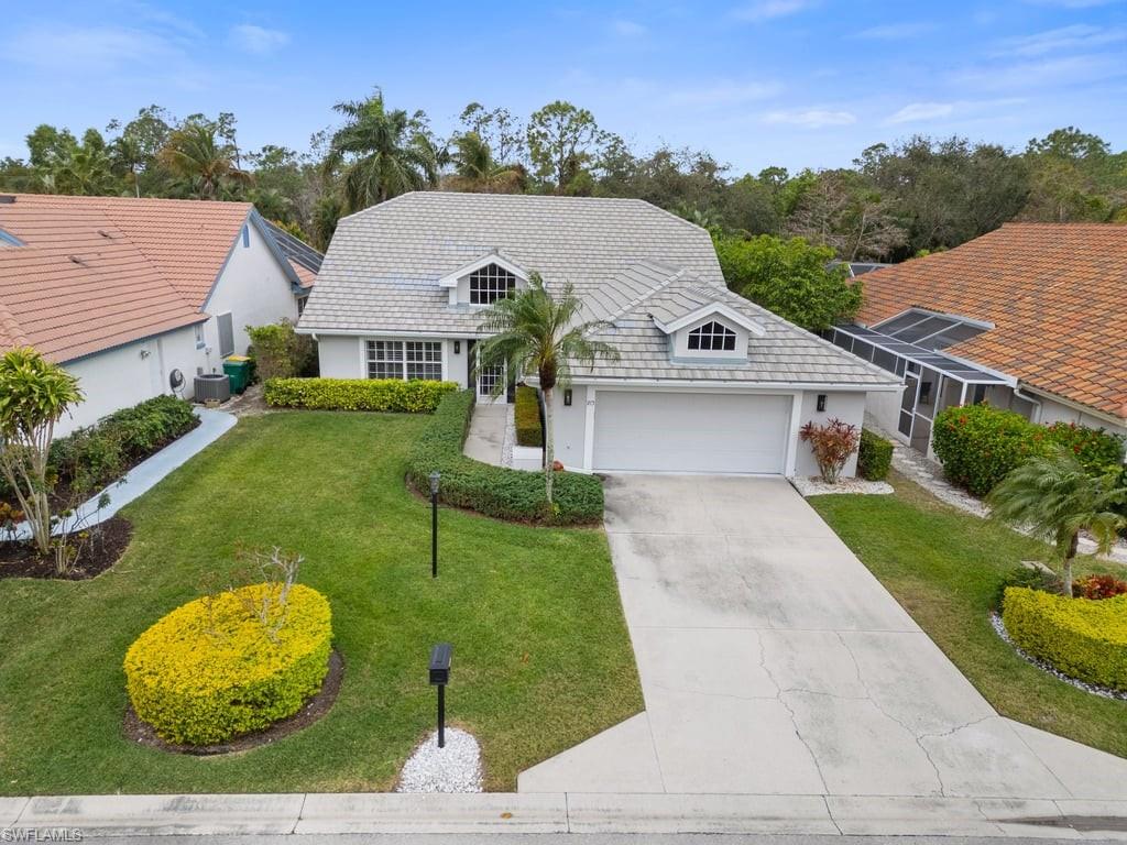 (Full Golf Membership) Located in the prestigious Glen Eagle Golf and Country Club in Naples, Florida, this stunning 3-bedroom, 2-bathroom furnished home boasts 2,004 square feet of beautifully designed living space. Featuring vaulted ceilings and tile floors throughout, the property is bathed in bright natural sunlight, creating an inviting and airy atmosphere. The formal living and dining rooms provide the perfect setting for entertainment, while the eat-in kitchen is a chef's delight, complete with natural wood cabinets, Corian countertops, and stainless-steel appliances. The primary suite offers relaxation and elegance, with sliding glass doors that open to the lanai, dual sinks, a walk-in shower and bathtub, and a spacious walk-in closet. Step outside to the expansive screened-in lanai, where you’ll be greeted by mature landscaping that offers tranquility and privacy—perfect for morning coffee or evening gatherings. The home also features a durable tile roof and a roomy 2-car garage. Adding to its unmatched appeal, this property comes with a deeded Full Golf Membership, granting access to Glen Eagle’s exceptional amenities. Enjoy the par-70, 18-hole championship golf course designed by Gordon Lewis, dine at The Divot Café or The 19th Hole Restaurant, and stay active with the community’s fitness center, tennis and bocce courts, and heated pool. Perfectly suited for golf enthusiasts and discerning buyers, this move-in-ready home offers world-class amenities and the coveted Naples lifestyle. Don’t miss this opportunity to make it your own!