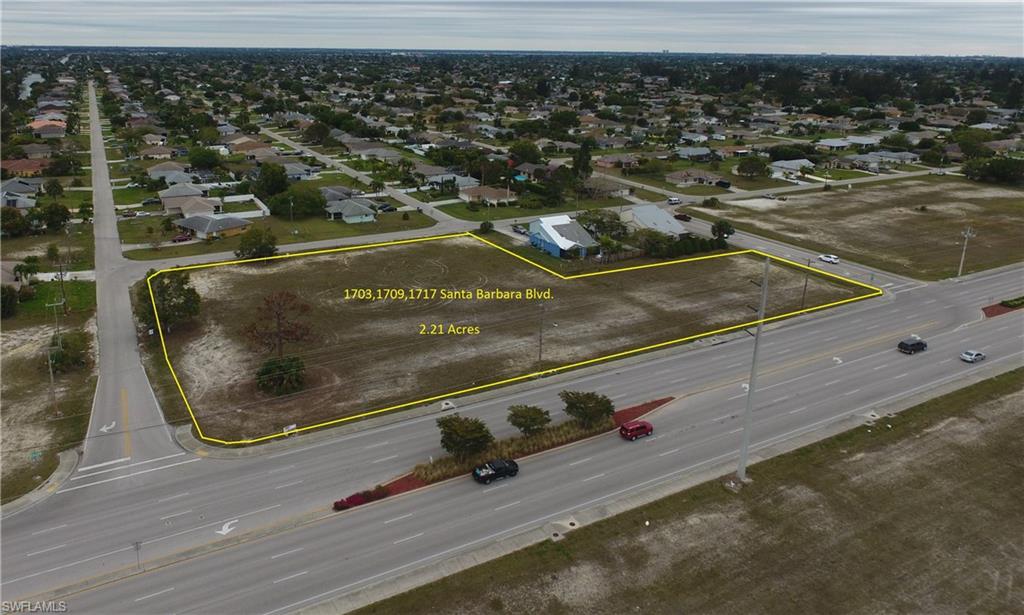Located in the center of town serving all quadrants of Cape Coral, this 2.21 acre site goes from street to street. Approximately 450 feet of Santa Barbara Blvd. frontage. 250' of depth on the northern part of this parcel, and 125' on the southern end. Median cut allows the southbound traffic ingress to the property through SE 18th Street allowing safe connection and eliminating U-Turns. This property was subject to both a city initiated future Land Use Map Amendment and a rezoning to Commercial / Professional and Commercial respectively which is a slight change from the current designation of the CAC (Commercial Activity Center). The City had plans to adopt these proposed changes in early 2019 and in mid August these proposed plans went into effect. This parcel has water, sewer and irrigation with assessments paid in full according to the city's utility web site. Many professional and medical uses are permissible such as day care, banking, chiropractic, accounting or attorney's office, insurance, cosmetology nail salon, financial planner, dentist, plus many others.