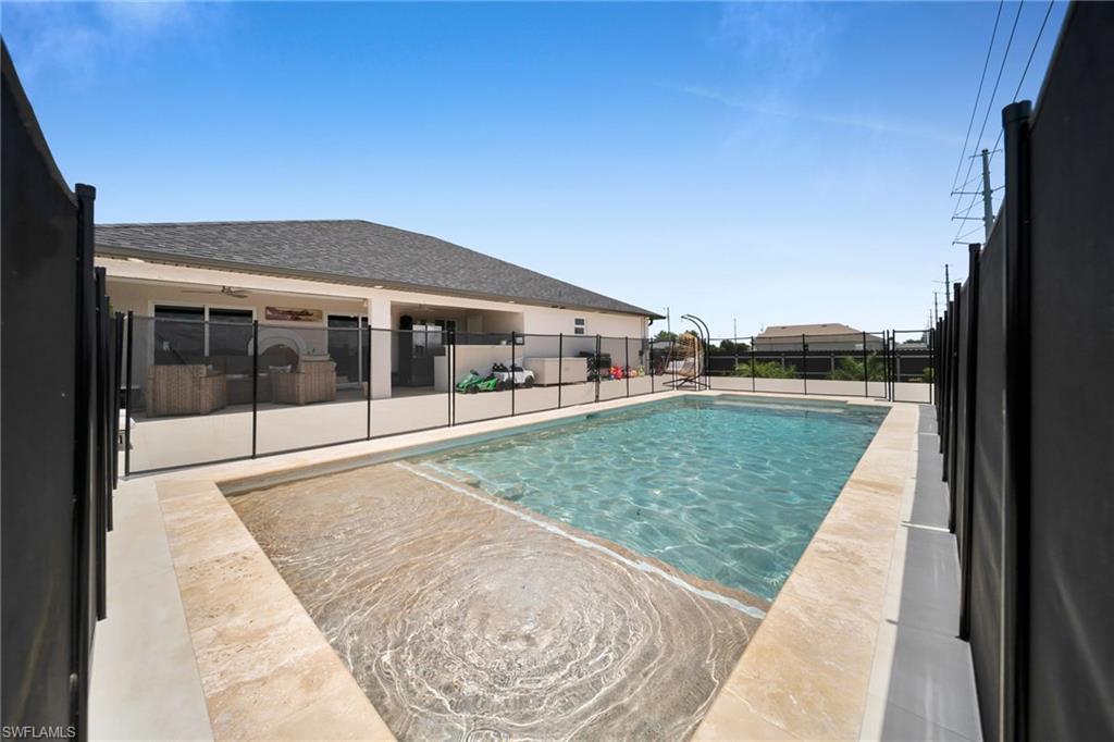 Welcome to this stunning home located in the desirable Northwest Cape Coral area Coral. This beautifully updated property combines comfort, style, and modern upgrades, offering exceptional value and peace of mind for its next owners.

Completely renovated in 2024, this home features new flooring throughout, fully remodeled bathrooms, and a new air conditioning system. Significant exterior improvements include a fully fenced backyard for added privacy and a heated swimming pool, allowing you to enjoy Florida living year round.

The property also features impact-resistant windows, providing enhanced safety, storm protection, and energy efficiency. Additionally, several rooms are equipped with motorized window shades, adding convenience, comfort, and a touch of modern luxury.

Inside, you'll find an open and functional floor plan with spacious living areas, high ceilings, and abundant natural light. The updated finishes throughout the home create a fresh, contemporary feel, making it truly move in ready.

Step outside to your private backyard oasis, where the heated pool and fully fenced yard provide the perfect setting for entertaining guests, family gatherings, or simply relaxing under the Florida sun.

Conveniently located in one of Cape Coral fastest growing areas, this home offers easy access to schools, parks, shopping, dining, and major roadways connecting you to the rest of the city.

Move in ready and loaded with upgrades, this exceptional property features a complete 2024 renovation, new flooring, remodeled bathrooms, new A/C system, impact windows, motorized shades in select rooms, a fully fenced yard, and a heated pool everything today's buyers are looking for.

Don't miss this incredible opportunity to own a beautifully updated home in Cape Coral, Florida!
