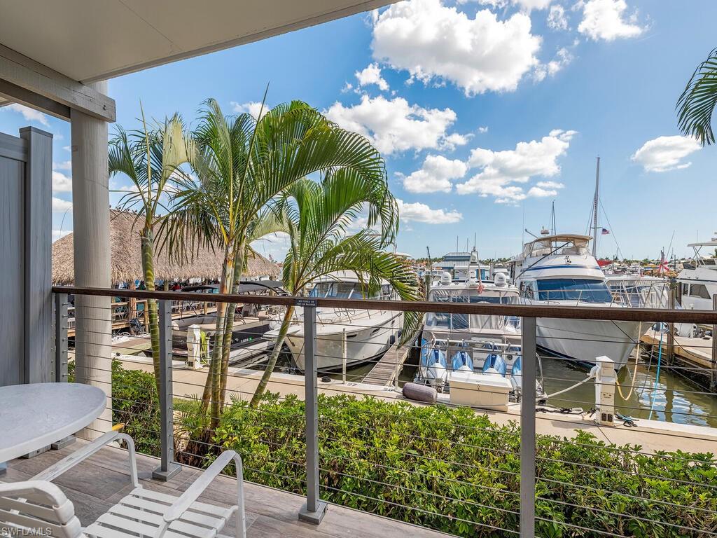 C9790 - Premium rental income candidate! Conveniently located merely steps to Naples' sugar sand beaches and the renowned fine dining, shoppes, and entertainment found on Fifth Avenue South and Third Street South!  This charming unit at the historic Cove Inn offers unsurpassed waterfront, chickee bar, and resort pool views from its private terrace.  Unit has been in the Hotel Rental Program, per The Cove Inn, and has positive history of income to show.  The future owner can choose to use the apartment for themselves to rent on an annual basis, or to allow the apartment to be in the Hotel Rental Program to earn rental income.