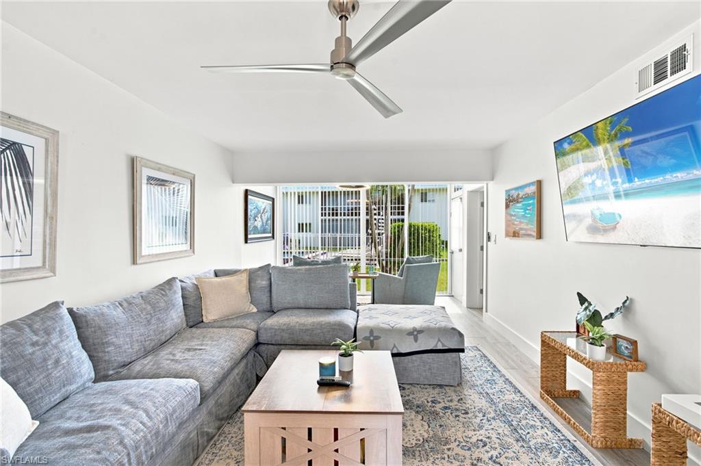 Experience the best of Naples waterfront living in this beautifully remodeled residence in the prestigious Royal Harbor community. Offering tranquil canal views, passing boats, and a bright contemporary design. This exceptional coastal retreat is just minutes from the white-sand Gulf beaches, world-class dining, and boutique shopping of Old Naples. Extensively remodeled throughout, this move-in-ready home features impact-resistant windows, fresh interior paint, porcelain tile flooring, and a stunning new kitchen with updated cabinetry, quartz countertops, and stainless-steel appliances. Both bathrooms have been completely renovated with elegant finishes. Ideally positioned on a desirable Chesapeake Manor the thoughtfully designed floor plan offers two spacious bedrooms, two beautifully updated bathrooms, a designated parking space, and a private storage room. Chesapeake Manor is an intimate, low-density waterfront community with only 16 residences, offering privacy, charm, and a relaxed coastal lifestyle. Located in one of Naples' most sought-after waterfront neighborhoods, Royal Harbor provides quick access to boating, downtown Naples. Whether you're searching for a full-time waterfront residence, a seasonal getaway, or an exceptional investment opportunity, this beautifully updated home offers the perfect combination of luxury, location, and carefree coastal living.