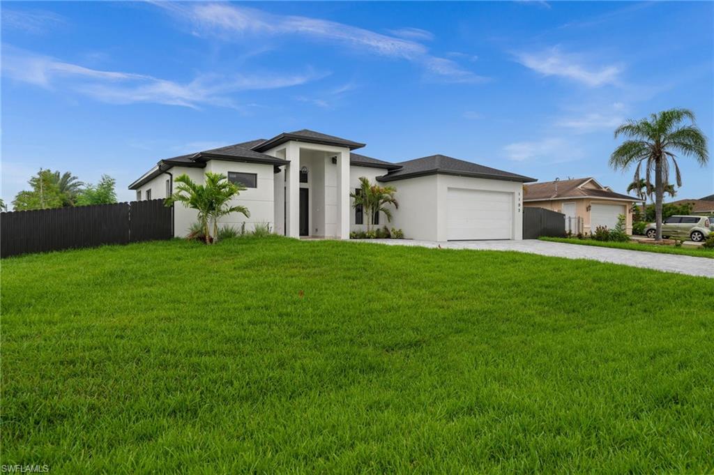 Welcome to this exceptional 3Bed + Den, 3 Bath residence designated for modern living Situated on a desirable corner lot . Featuring a spacious open- concept layout, elegant finishes ,abundant natural throughout, and stunning European - style kitchen with quality cabinetry and elegant details throughout .
Enjoy your own private outdoor oasis complete with a beautiful pool, covered patio, and a built-in grill area, perfect for relaxing or entertain family and friends. This home offers both comfort and sophistication. 
This New Construction home is located in one of Southwest Cape Coral's most growing neighborhoods.