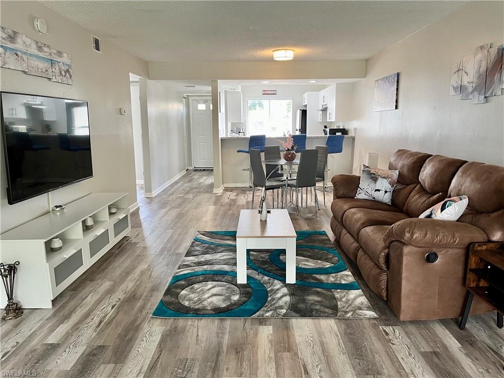 Escape to paradise in this spacious and beautifully updated 2-bedroom, 2-bathroom seasonal rental in the desirable Sunrise III community. Tastefully furnished and move-in ready, this first-floor residence offers everything you need for a comfortable and relaxing stay in Naples.  The thoughtfully designed split-bedroom floor plan provides privacy and flexibility, while offering abundant storage with large walk-in closets and an oversized in-unit laundry/storage room with plenty of space for bicycles, golf clubs, beach gear, and more.  In this quiet, non-gated community, you'll be just minutes from Naples' finest restaurants, shopping, the CAT bus line, downtown Naples, and the world-famous Gulf beaches.  Community amenities include a resort-style swimming pool and expansive green space perfect for enjoying Florida's sunshine and tropical lifestyle.  Whether you're looking for a winter retreat or an extended stay in Southwest Florida, this exceptional seasonal rental offers comfort, convenience, and an unbeatable location.