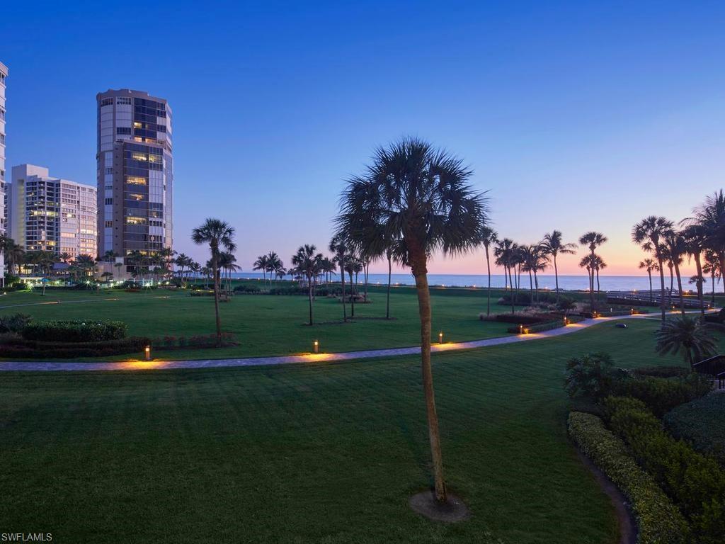 Completely renovated and turnkey furnished, this 3 BR, 3 Bath beachfront residence at Esplanade Club offers effortless Gulf-front living in Park Shore. Floor-to-ceiling windows and sliding doors open to a spacious wraparound balcony with beautiful Gulf views, perfect for entertaining and sunset watching. Enjoy full service building amenities including 24-hour front desk, pool and spa, fitness center, beautifully renovated social room with catering kitchen, outdoor fireplace and bar, observation deck, tennis, pickleball, bocce, putting green, golf practice net, kayak/paddle-board storage, bike storage, covered garage parking. Second floor 1 car garage.
Building located directly on the sand, across from Venetian Village, with easy access to upscale dining, shopping, Waterside Shops, Mercato, Artis—Naples, and downtown Naples. A rare opportunity to own a move-in-ready, renovated, turnkey furnished Gulf-view residence in one of Naples most desirable beachfront addresses.