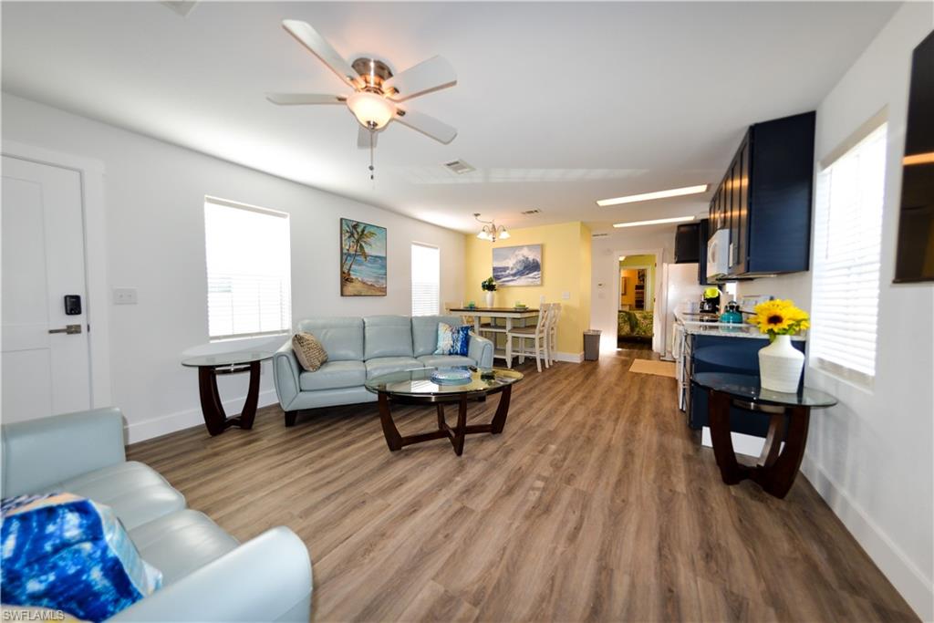 Welcome to your slice of island living on San Carlos Island! This 2014-built manufactured home offers a well-maintained 2-bedroom, 2-bath layout with 924 sq ft of comfortable living space in  Helen Lane Condo RV community. 
Step inside to an open living and dining area with updated vinyl flooring and a bright, functional kitchen featuring modern appliances and ample cabinet space. The split-bedroom floor plan provides privacy, while both bathrooms offer convenient, easy-care finishes.
Enjoy the benefits of low-maintenance living with central air, in-residence laundry, and two assigned parking spaces. The property is being offered semi-furnished, giving buyers the opportunity to personalize the space to their taste. 
Located near Fort Myers Beach, marinas, restaurants, and waterfront attractions, this property is ideal.
Low monthly condo fees include water, trash, and street maintenance, adding to the overall value and convenience.
Please note: Listing photos were taken in 2023 and reflect staged interiors. Current furnishings and décor may differ and may be more minimal.