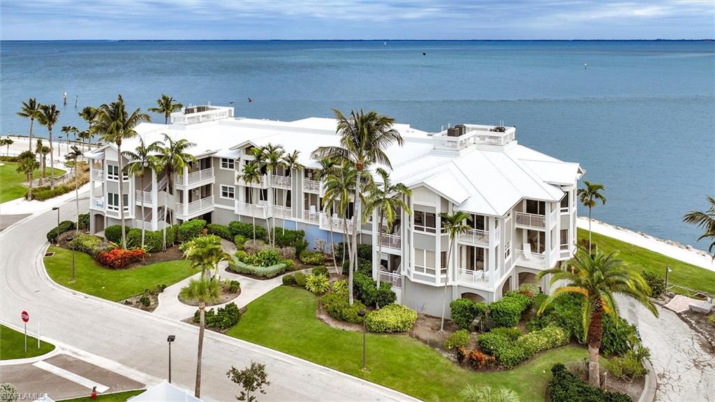 Wake to breathtaking sunrises over Pine Island Sound and toast the evening as the sun melts into the Gulf of Mexico from this stunning waterfront retreat on Captiva Island.  This beautifully appointed three-bedroom, three-bathroom condominium feels more like a private luxury yacht than a traditional residence, perched directly on the Sound with panoramic water views. Watch dolphins dance through the shallows, shorebirds glide along the coastline, and sport fishermen venture out at first light. From the spacious open-air balcony, golden sunsets over the Gulf become your nightly ritual.  The coveted Seabreeze floor plan lives graciously, with two of the bedrooms featuring its own ensuite bath and direct access to a generous lanai. A complete renovation has just been finished, showcasing premium stainless steel appliances, elegant quartzite countertops, a charming shiplap breakfast bar, all-new bathrooms with designer mirrors, updated flooring throughout, and windows and doors meeting or exceeding current Florida building standards. Partially furnished with a coastal living and dining collection, this home is truly ready for your personal signature.  The surrounding neighborhood offers an unparalleled island lifestyle. Nearby, the Captiva Kayak Launch invites effortless waterfront exploration. With membership, residents enjoy world-class amenities including the Bayview pool complex just footsteps away, a seaside golf course, children's programs, watersports, three waterfront dining destinations, and the Captiva Landing water park.  This is more than a home — it is an elevated island lifestyle where every day feels like a getaway. Schedule your private showing today.