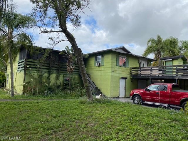 FIXER UPPER WITH GREAT POTENTIAL!  1.25 fully fenced parcel with 2 story home, detached building, large hen house/chicken coup.  Lots of concrete slabs for parking, RV's and storage.  This property offers the ability to use your imagination to make your dream family compound in this fast growing area.  Montura Ranch is quickly growing and offers a clubhouse, soccer field, basketball courts, pool and access to more than 2k acres of recreational area of hunting, fishing and ATV fun. Cash Offer only.