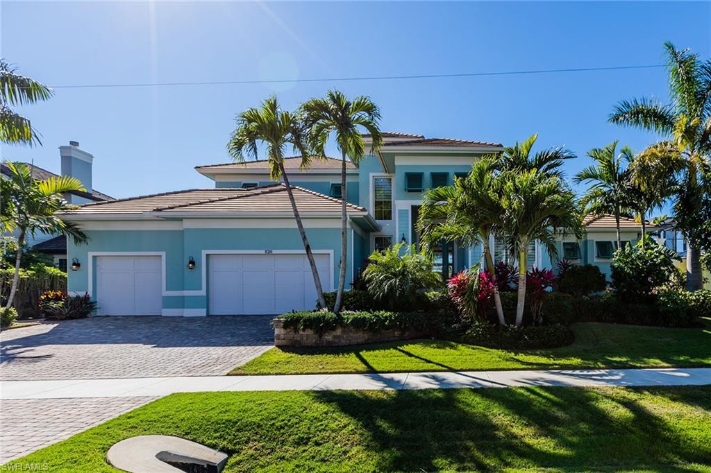 Wow! Don’t miss this great opportunity for a beautiful, direct access boater’s treasure in the highly desirable south end of Marco Island. Custom built in 2017, this three-bedroom plus den and loft, three-car garage coastal-design residence offers quick deep water access to Caxambas Pass and the scenic Ten Thousand Islands. Perfectly located on a wide waterway with sunny southwestern exposure and gorgeous sunsets. Spacious and inviting great room floor plan offers the finest quality details and finishes throughout, including wood and marble flooring, custom ceilings, crown molding and a chef’s kitchen with gas range, quartz countertops and custom cabinets. Entertain or just relax on the expansive lanai with sparkling pool and spa, summer kitchen and a cozy sitting area with a gas fireplace and big-screen TV. Large dock with two boat slips with lifts, ready for the serious boater. This is Marco Island waterfront living at its very best.