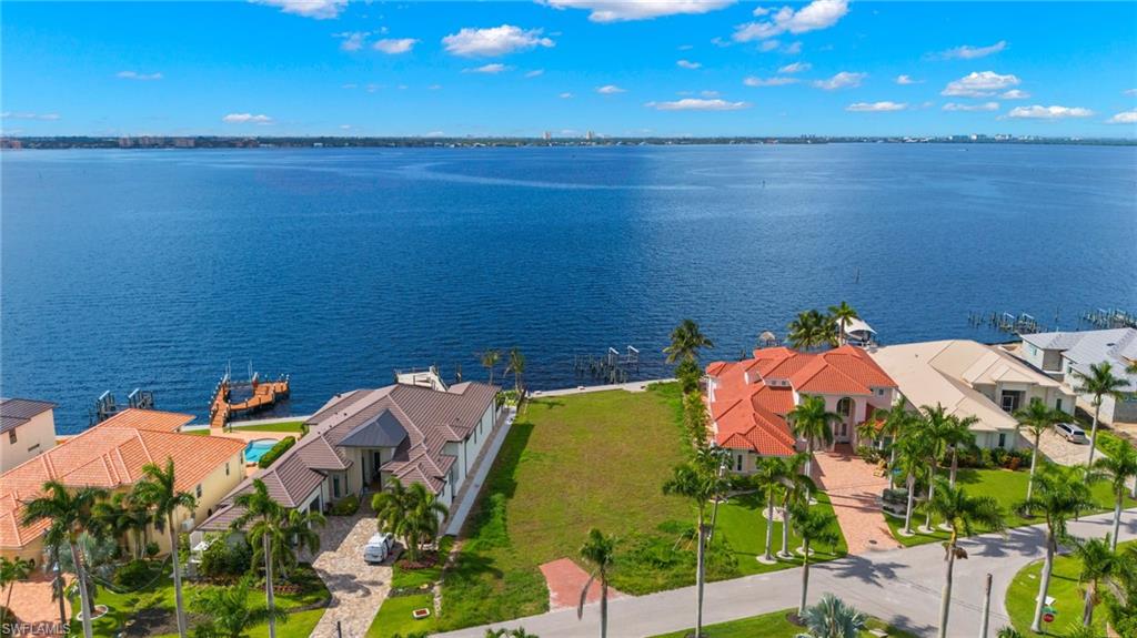 BUILD THE WATERFRONT HOME OF YOUR DREAMS HERE! Don’t Miss an Incredible Opportunity to Build in the Highly Sought After Yacht Club Area on Cape Coral’s Premier Royal Palm Lined Street that Truly Offers it All. You Will Enjoy Unobstructed and Expansive Views of Redfish Cove, Brilliant Southern Exposure on an Oversized Cleared and Ready to Build Lot. Truly a Boater’s Paradise with Quick Deep Water Access to the Gulf of Mexico Located on the Quiet Side of the River within the Manatee Idle Wake Zone. Live the Florida Lifestyle and Fish from Your Own Dock while Catching an Array of Fish that Regularly Appear - Snook, Redfish, Trout, Triple Tail and Tarpon all Caught Here! Don’t Miss the Opportunity to Create Your Very Own Waterfront Oasis on this Quiet Neighborhood Street and Enjoy Quick Access to Beaches, Shopping, Dining, Fort Myers and the Airport. With this Location and Breathtaking Wide River Views It Doesn’t Get Much Better Than This. Call Today!