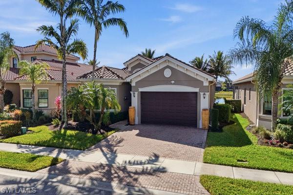 Lakefront home in North Naples with 4 bedrooms, 3 baths and just a short walk to the Marbella Isles clubhouse and resort-style amenities. Ideally located within the community and offering convenient access through both the Livingston Rd and Airport-Pulling Rd gated entrances.

Built by GL Homes in 2016, this well-maintained residence offers 2,452 sq ft of living space with high ceilings, elegant marble flooring in the main living areas, and peaceful lake views from both the living room and primary bedroom. The screened lanai provides the perfect space to relax and enjoy the waterfront setting.

The outdoor lanai is ideal for entertaining, featuring a beautiful lake view and an outdoor kitchen with a propane cooktop, sink, and granite countertop for convenient outdoor cooking.

The kitchen features stone countertops, stainless steel appliances, a large center island, walk-in pantry, and roll-out trays in the cabinetry for added convenience.

The versatile floor plan offers 4 bedrooms, with one currently used as a guest bedroom and office with a closet. Bedrooms include fresh paint, new carpet, walk-in closets, and custom shelving.

Additional features include a laundry room with washer and dryer and an attached 2-car garage.

Residents of Marbella Isles enjoy a beautifully maintained community with resort-style amenities including a clubhouse, pool, fitness center, tennis courts, pickleball courts, and a separate kiddie pool. Private gate access to the Osceola Trail provides convenient walking access to Osceola Elementary and Barron Collier High School.

Conveniently located approximately 10 minutes to Naples beaches and Mercato, about 5 minutes to I-75, and just minutes to shopping, dining, and Publix.