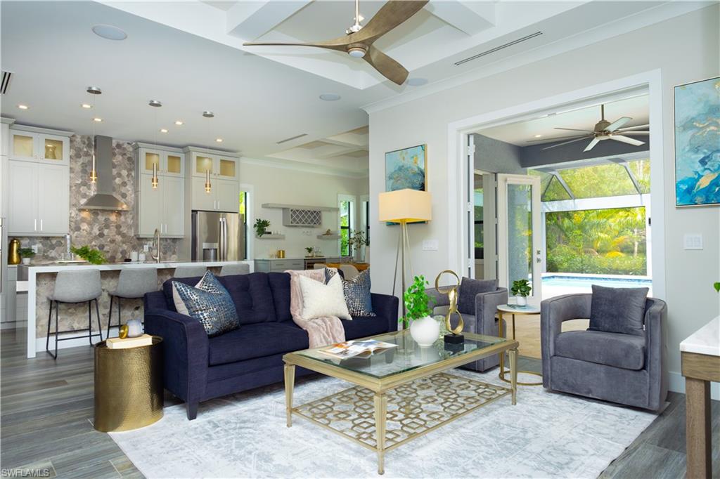 Enter your dream home in the sunny enclave of Naples, Florida! Situated in the highly sought-after Logan Woods neighborhood, this exceptional property showcases a cutting-edge solar power system with a reliable battery backup—a savvy choice for those aiming to reduce their carbon footprint and cut down on energy costs. Constructed in 2019, this contemporary and expansive residence boasts 4 bedrooms and 3 baths, offering ample living space for families or individuals who love to entertain.

Equipped with a screened-in lanai and a captivating pool/hot tub area, the outdoor space provides a tranquil oasis for relaxation and socializing. Whether you prefer lounging or hosting gatherings, this area caters to both, ensuring a perfect blend of leisure and entertainment. The generous lot, coupled with a fully fenced-in yard, guarantees privacy and plenty of space to enjoy the delightful Florida weather. Moreover, the property is conveniently located just 15 minutes from the beach, seamlessly merging coastal living with the modern comforts of home.

This residence is a true gem, seamlessly combining eco-friendliness, contemporary design, and comfort. Don't miss the chance to turn this extraordinary property into your forever home!