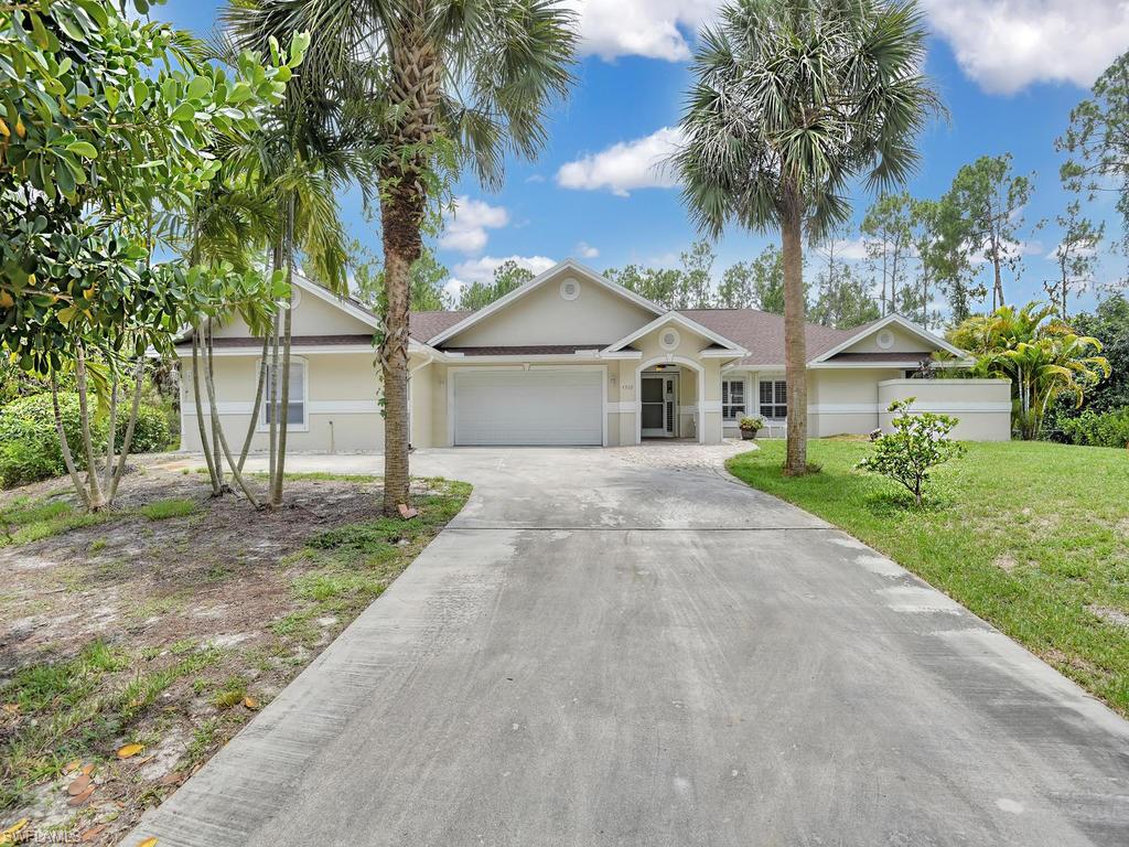 Homes like this don't come along often! This beautiful home sits on 2.8 fenced acres with solar powered entry gate. Ideal location off Collier Blvd in top school district.  Looking for additional in-law apartment or guest apartment, this home has just that. Enter through separate entrance or through main home garage, the one bedroom one bathroom guest/ in-law apartment has a full kitchen and living room with its own screened patio.  The apartment was completely remodeled this year and is extremely comfortable. The main home is loaded with upgrades, whole home propane generator with 1000 gal propane tank, new roof 2019, new solar system that runs water heater, new AC, new whole home reverse osmosis system with 300 gallon tank, Hurricane shutters both accordion and electric rolling screens, solar attic fans and all new appliances. Main home has three bedrooms and two bathrooms, both guest bedrooms have walk in closets and the guest bathroom also has access to the pool. Large master bathroom with corner garden tub. Enjoy entertaining on the large lanai with a newly resurfaced salt water pool. Outside the home there is a new RV carport 18' x 38' to store your boat or RV out of the sun.