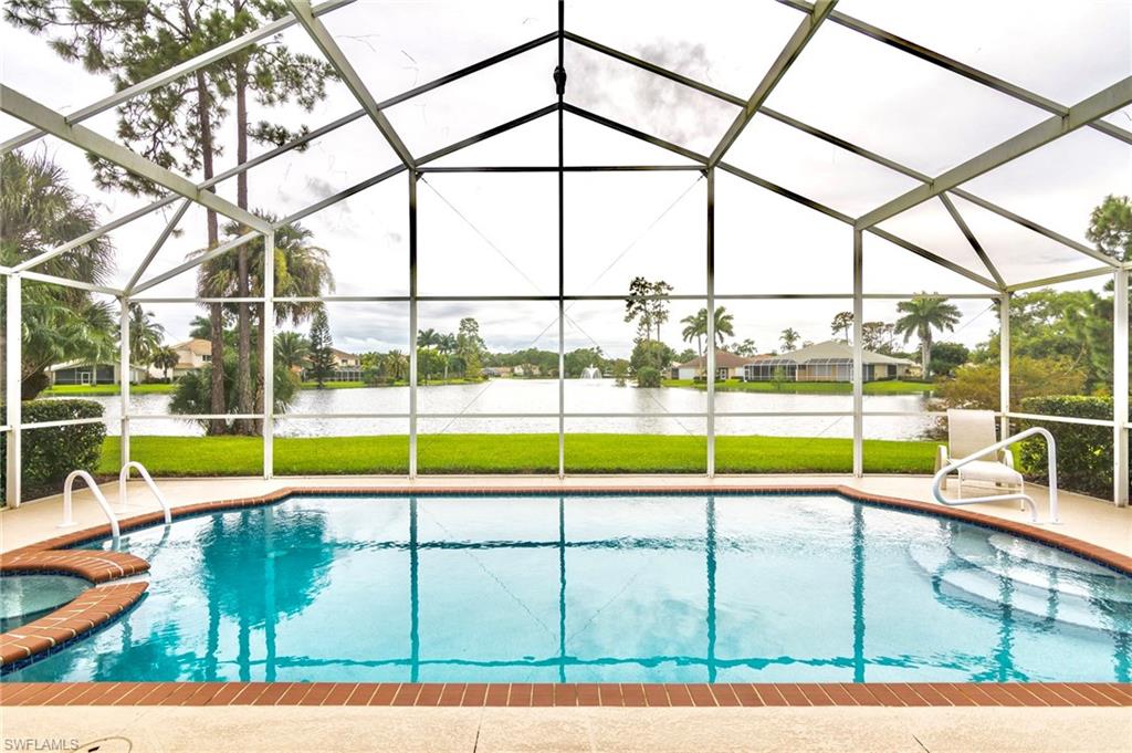 The Shores, Naples - this amazing rarely available & highly desired home offers a long lake view allowing you a direct view of the lighted fountain & amazing sunsets.
This home shows like a model, completely remodeled kitchen with the most current highly desired designs, stainless appliances and granite counters.  
The open floor plan creates a very nice flow making the home appear much larger.   The 3 bedroom, 2 bath with   POOL, SPA & resort style lanai, oversized garage with a 4 ft extension & the main entry with double doors  opening from the front screened porch allowing the breeze to flow through your new home make it a true gem..   Oversized diagonal tile in every room, crown molding (even inside the oversized closets), fans throughout the home, recently painted & prewired for a generator.   Stop by the beautiful clubhouse to view all the amenities this community  to offers. 
Located in close proximity to Naples’ premiere shopping & dining,  Fifth & Third Avenues. Minutes to the beach and attractions such as the Naples Zoo, Naples Botanical Gardens + so much more. Living in the Shores you’ll enjoy the brief, easy drive to these wonderful places to visit, shop and eat.