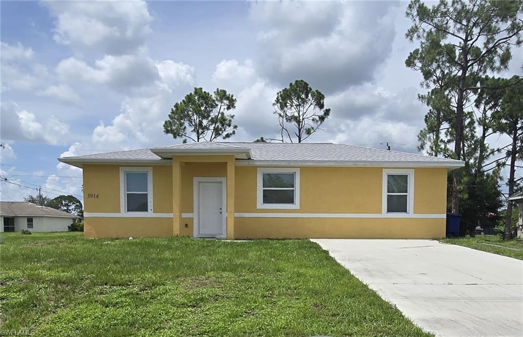 Welcome to a charming single-family home nestled in the heart of Lehigh Acres, FL. This home boasts three spacious bedrooms, including a primary bedroom with an ensuite bathroom with a large tiled shower. The home also features two full bathrooms, ensuring ample space for everyone. The eat-in kitchen, equipped with a stainless steel appliance package that includes range with oven, microwave, dishwasher and full-size refrigerator. Wood shaker cabinets, is ready for your culinary adventures. The home is situated on a large corner lot, providing a generous backyard for outdoor activities or pets. The location is unbeatable, with easy access to downtown Lehigh, SR 82, and FT Myers. The beautiful tile flooring throughout the home adds a touch of elegance and is easy to maintain. An inside laundry with washer and dryer hook-up adds to the convenience. Pets are welcome, and our application process is a breeze. This move-in ready home is one of the best-priced 3 bed, 2 bath homes in Lehigh Acres.