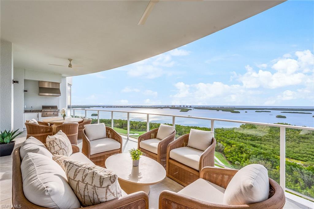 Immerse yourself in the pinnacle of luxury living. Nestled on the 16th floor of Omega at Bonita Bay, this 3-bedroom plus den, 3.5-bathroom residence spans an impressive 4,210 square feet. From the private elevator, you’ll be greeted by an open layout illuminated by natural light and accentuated by 10-foot ceilings, linear air vents, designer light fixtures, and elegant flooring throughout. The kitchen boasts Wolf and Sub-Zero gas cooking appliances, overlay-style white cabinets, quartz countertops, walk-in pantry, and a grand 4-seater center island. This exquisite space unfolds into two living rooms and a dining area, all framed by a 78-foot-wide unobstructed view of the Gulf, Bay, and golf course. The western exposure ensures spectacular sunsets from the covered terrace, where an outdoor kitchen awaits, perfectly designed for lounging and dining. Each bedroom is complete with an ensuite bathroom and walk-in closet with built-ins. Added peace of mind provided by impact glass and private two-car garage. Amenities include 24-hour staff, resort pool, spa, putting lawn, rooftop terrace, fitness, steam room, game room, dog run, theatre, social rooms, and guest suites.