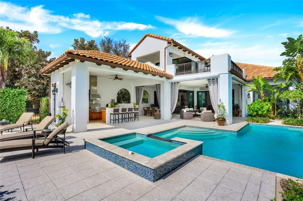 Enjoy the quintessential coastal California look in this model residence that offers southern exposure and expansive views over the picturesque Talis Park golf course. Combining traditional old world influences with clean contemporary lines, the two-story home features light wood floors, cathedral ceilings, driftwood toned beams and arch details. A great room floor plan maximizes the connection between the indoor and outdoor space. The exquisite furnishings, window and wall coverings were all curated by Design West to create a casual and elegant space.