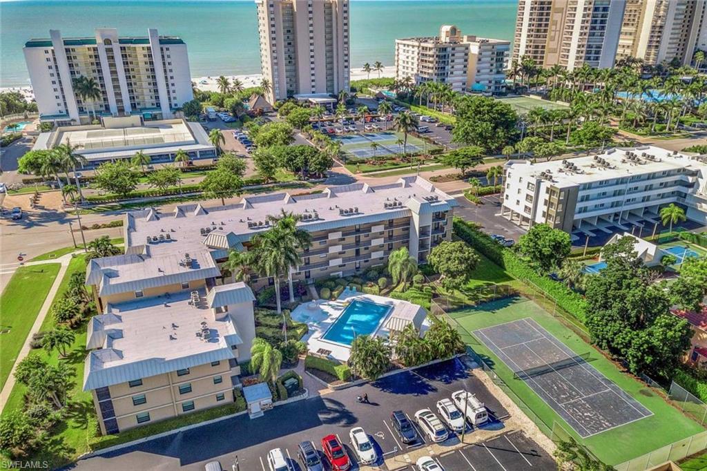 Can you imagine having a beverage on your patio while watching the sunset in paradise? This 2 bedroom/2 bathroom is right across the street from South Beach! Enjoy your chic, turnkey furnished condo with new mattresses, TVS, and living room furniture! Natural light flows through this peaceful residence. Take delight in the breakfast bar with stainless steel appliances and plenty of seating at the dining room table.  In unit Washer and dryer with shelving. Wood flooring in both bedrooms. Both bathrooms have granite counter tops and updated light fixtures. Master bathroom has a walk in shower and a large walk in closet. Guest bathroom has a shower/tub combo. Swim in the sparkling pool, grill, or play tennis! Can you imagine having a beverage on your patio while watching the sunset in paradise? This 2 bedroom/2 bathroom is right across the street from South Beach! Enjoy your chic, turnkey furnished condo with new mattresses, TVS, and living room furniture! Natural light flows through this peaceful residence. Take delight in the breakfast bar with stainless steel appliances and plenty of seating at the dining room table.  In unit Washer and dryer with shelving. Wood flooring in both bedrooms. Both bathrooms have granite counter tops and updated light fixtures. Master bathroom has a walk in shower and a large walk in closet. Guest bathroom has a shower/tub combo. Swim in the sparkling pool, grill, or play tennis! Storage closet located on the patio for your convenience! Quarterly fees are only $2,950!