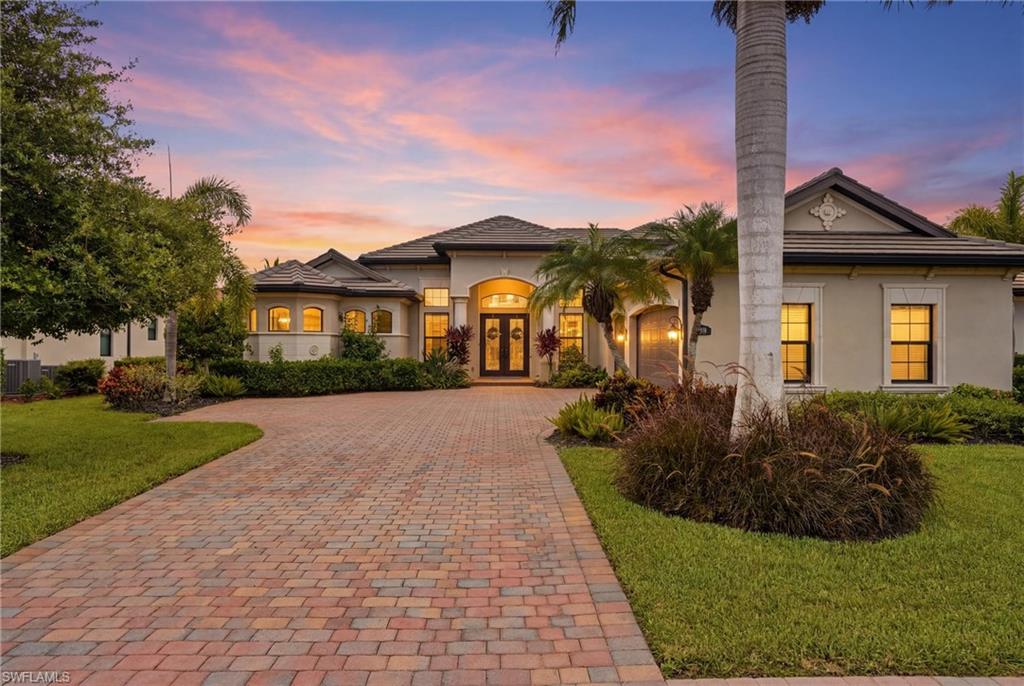 Perfectly positioned along the championship TPC golf course in Treviso Bay, this exceptional 4-bedroom + den, 4-bath residence offers over 3,600 square feet of refined living with breathtaking panoramic golf, lake, and sunset views.

Designed for both elegant entertaining and everyday comfort, the thoughtfully crafted floor plan features soaring ceilings, an expansive great room filled with natural light, and a gourmet kitchen with gas cooktop, premium appliances, walk-in pantry, and breakfast area overlooking the resort-style pool and fairway.

The first-floor owner’s suite is a private retreat featuring spectacular views, a spacious sitting area, oversized walk-in closet, and spa-inspired bath. Upstairs, an expansive bonus room with wet bar and full bath provides exceptional flexibility for guests, a media room, home office, or game room.

Outdoor living is truly the highlight, with multiple covered entertaining areas, an outdoor kitchen, sparkling pool and spa, and one of Treviso Bay’s most picturesque golf course settings—perfect for enjoying Naples’ beautiful sunsets year-round.

Recent improvements include a new roof, impact windows and doors, updated appliances, new garage door, and numerous additional enhancements that reflect the home’s exceptional care and quality.

Deeded TPC golf membership is included, providing immediate access to championship golf along with Treviso Bay’s world-class amenities, including a magnificent clubhouse, resort-style pool, fitness center, tennis, pickleball, spa, and exceptional dining.

Whether hosting unforgettable gatherings or enjoying quiet evenings overlooking the championship golf course, 9915 Corso Bello offers an exceptional blend of luxury, privacy, and the incomparable Treviso Bay lifestyle.