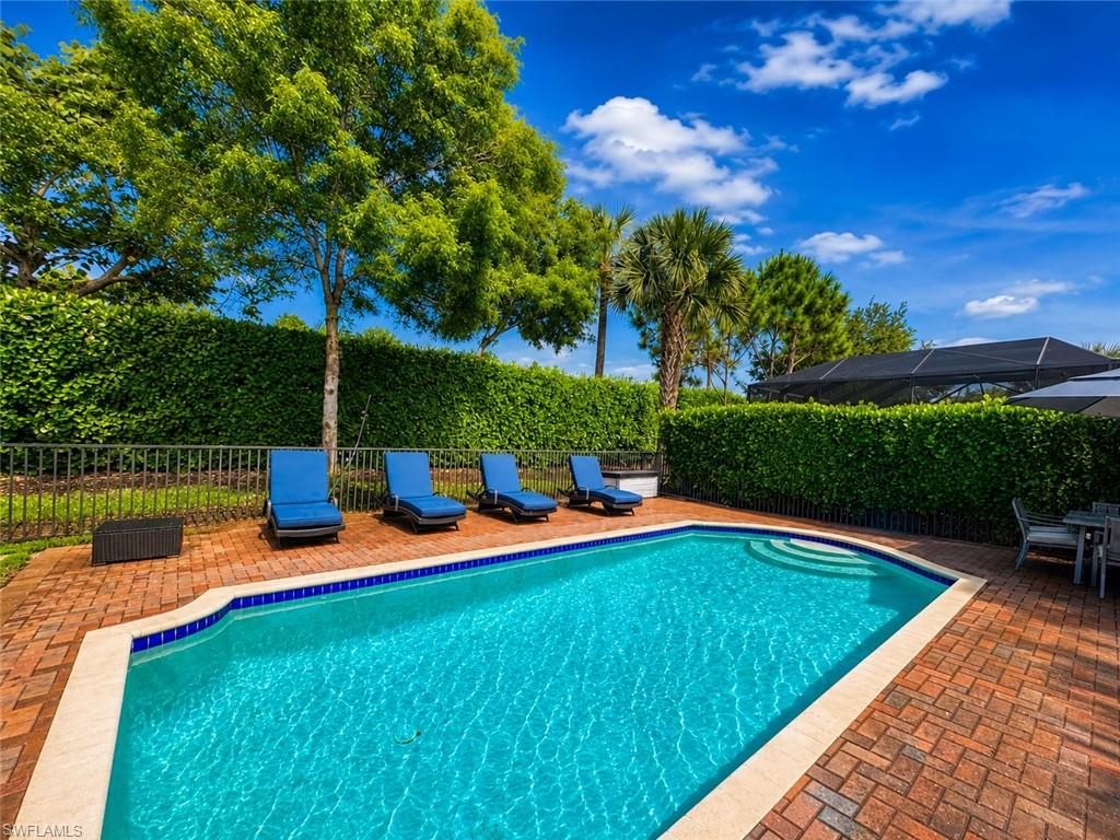 Experience elevated Florida living in this truly one-of-a-kind contemporary residence within StoneCreek, one of Naples' most sought-after gated communities. Ideally located within a highly rated A+ school district and just minutes from world-class dining, shopping, entertainment, beaches, golf, and everyday conveniences, this exceptional home offers a lifestyle that appeals to families, professionals, retirees, and seasonal residents alike.
From the moment you step through the front door, you'll be captivated by the home's open-concept design and thoughtfully curated coastal contemporary aesthetic. Warm, earthy tones blend seamlessly with sophisticated modern finishes, creating an inviting atmosphere that is both elegant and comfortable.
The luxurious first-floor owner's suite provides a private retreat, while the second level features a spacious loft, three generously sized guest bedrooms, and two beautifully customized bathrooms, offering flexibility for family living, visiting guests, or a dedicated work-from-home setup.
At the heart of the home is a stunning chef-inspired kitchen showcasing custom cabinetry, quartz countertops, a cabinet-style pantry, and premium appliances. Every bathroom has been uniquely designed with upscale finishes, while custom engineered wood flooring and designer wall paneling flow throughout the residence, adding character and refinement to every room.
Outdoor living is equally impressive. The expansive screened lanai features a resort-style pool, outdoor kitchen, and lush tropical landscaping that creates a peaceful sense of privacy and tranquility—perfect for entertaining, relaxing, or enjoying Naples' year-round sunshine.
Additional highlights include a spacious multi-vehicle driveway, two-car garage with custom epoxy flooring, dual-zone HVAC systems, and an extensive list of premium upgrades throughout the home.
Professionally designer-decorated with fine art and high-end furnishings, many of which are negotiable, this residence offers a rare opportunity to own a truly custom home where luxury, comfort, and style come together seamlessly. Homes of this caliber are rarely available—this is a must-see property for buyers who appreciate exceptional craftsmanship, designer finishes, and sophisticated modern coastal living.