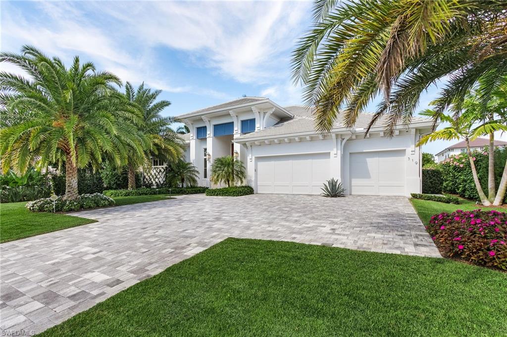 Situated on one of the prettiest streets in Park Shore, 519 Turtle Hatch Lane is a light and bright home built by Borelli Construction of Naples. The home has designer and high end finishes throughout including Legno Bastone French white oak flooring, Crestron lighting and home automation systems, leathered Taj Mahal quartzite on kitchen island, marble mosaics in bathrooms and Wolf/SubZero appliances. Centered around a great room floor plan, the guest bedrooms are split from the owner's suite. The large owner's suite has dual closets and water closets and a marble clad bathroom. Coming into the home from the three-car garage, the laundry room is conveniently placed across the entry and then a key drop area with additional storage down the hall. The outdoor lanai, which is protected by retractable screens and hurricane shutters, has distinct living areas. One with a cozy fireplace, and the other with a full outdoor kitchen and plenty of room for dining furniture. Lush landscaping outside creating great privacy and a tropical feel. The pool is complete with a sunshelf, spa and water bowls. Turtle Hatch Lane is a quiet street and is conveniently located near Venetian Village.
