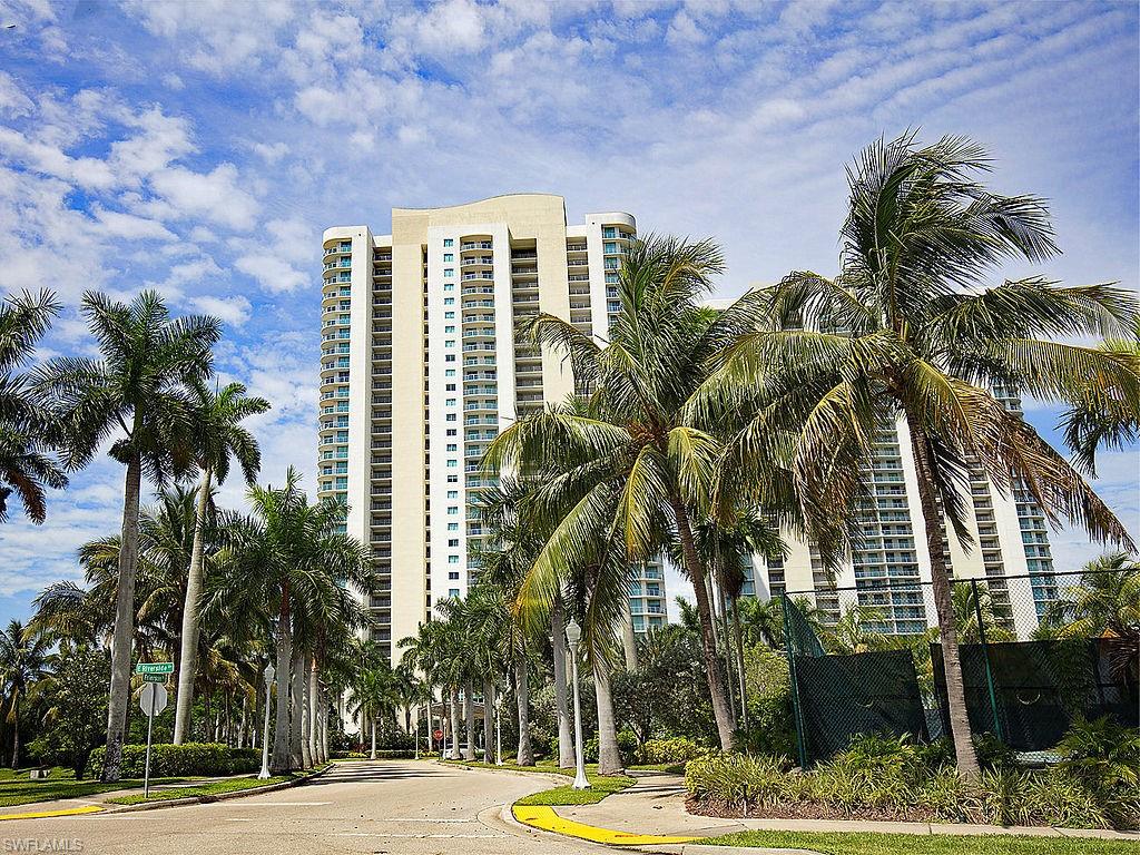 Downtown Fort Myers Oasis high rise.  Turnkey furnished and beautifully renovated.  This 5th-floor residence captures one of the most stunning waterfront views in the Oasis.  Featuring a panoramic Western exposure over the Caloosahatchee River with spectacular sunsets every evening. Two bedrooms, two baths, and 1,249 square feet of open-concept living with wood plank tile flooring throughout and a gourmet-style kitchen positioned to take in the perfect water view. Floor-to-ceiling glass frames the river from nearly every angle and opens to a wide, unscreened balcony, the kind of seamless indoor-outdoor flow that makes this floor plan so sought after. The Oasis delivers a true resort lifestyle across meticulously maintained riverfront grounds: guard-gated entry, key-pass building access, front desk concierge, renovated pool and expansive sun deck, spa, sauna, fitness center, tennis and pickleball, billiards and business lounge, BBQ area, dog park, and a riverfront walking path as well as covered under building parking.  Rentals are permitted and pets are welcome. Catch the seasonal trolley just outside the gate to the downtown River District, minutes away, with waterfront dining, boutique shopping, galleries, and entertainment!!