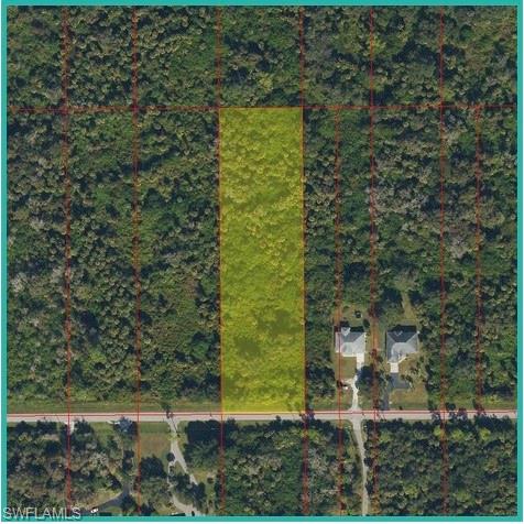 Discover the perfect opportunity to build your dream estate on this stunning 2.73-acre property in the highly desirable Golden Gate Estates. Offering the ideal blend of privacy, peace, and possibility, this exceptional parcel provides a serene natural setting while remaining conveniently located less than 15 minutes from schools, shopping, dining, and everyday conveniences. Whether you envision a private estate, a place for horses, ATVs, a workshop, or simply room to roam and enjoy nature, there is ample space to bring your vision to life. Enjoy the rare combination of seclusion and accessibility while creating a lifestyle uniquely your own. This beautiful piece of land offers endless possibilities for those looking to spread out, unwind, and invest in their future while enjoying the peaceful country setting that Golden Gate Estates is known for. If you've been searching for a property that offers privacy, freedom, and room to create the lifestyle you've always wanted, this exceptional 2.73-acre parcel checks every box.