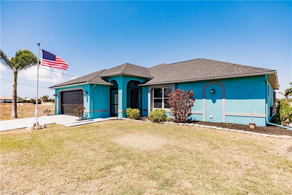 This updated 4 bedroom, 2 bath pool home located in the growing community of Cape Coral offers open floor plan with Great Room concept. Updates include new roof, new AC system, new storm shutters, new pool cage screens, fresh interior and exterior paint, new tile on porch and lanai, and list goes on! Key features include soaring vaulted ceilings, plant shelves, blinds throughout, and new laminate wood plank flooring in main living areas, wood plank tile flooring in master bedroom, and carpet in other bedrooms. Kitchen boasts warm wood cabinetry, stainless appliances, island with tile knee wall and decorative pendant lighting that opens to the main living area for easy entertaining. Master suite has 2 walk in closets and updated en suite bath with dual sinks and custom tiled roman shower. Enjoy your leisure time relaxing in your heated saltwater pool with extended deck or entertaining and relaxing on cooler evenings by the fire pit on the patio. Other features include laundry room, storm shutters, water softener, R/O system, and irrigation system. Proximity to local waterways, beaches, dining, shopping, and golf courses makes this property ideal for the Florida lifestyle.