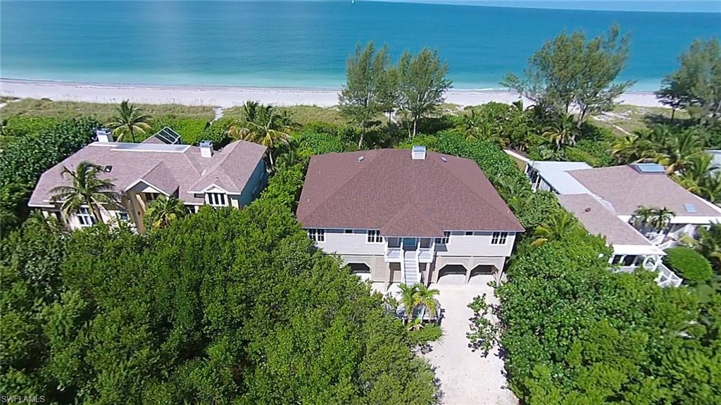 Imagine dreams become a reality while relaxing on your private open deck overlooking the blue-green waters of the Gulf of Mexico with this Florida Style inspired custom home offering unsurpassed views. Located in the secluded section of South Seas Island Resort, this distinctive home offers the best of both worlds. You will experience privacy while still being only steps away from the shopping, dining, nature, outdoor activities and more. A crowning achievement, this picturesque home presents over 3800 square feet of living space with exquisite appointments. Four bedrooms and three and one half baths! The split floor plan offers a separate large guest suite and private bath devoted to the south side of the home with glorious views of the water. 1119 Schefflera Court provides everything for the family and for entertaining from a deck that fully extends the rear of the home to the epicurean eat-in kitchen, a sitting room and liberal living space.  Beach Homesites are located within the gates of South Seas Island Resort in a low-density community offering a private community pool, pool house and tennis court.  All located in a close proximity to this home.